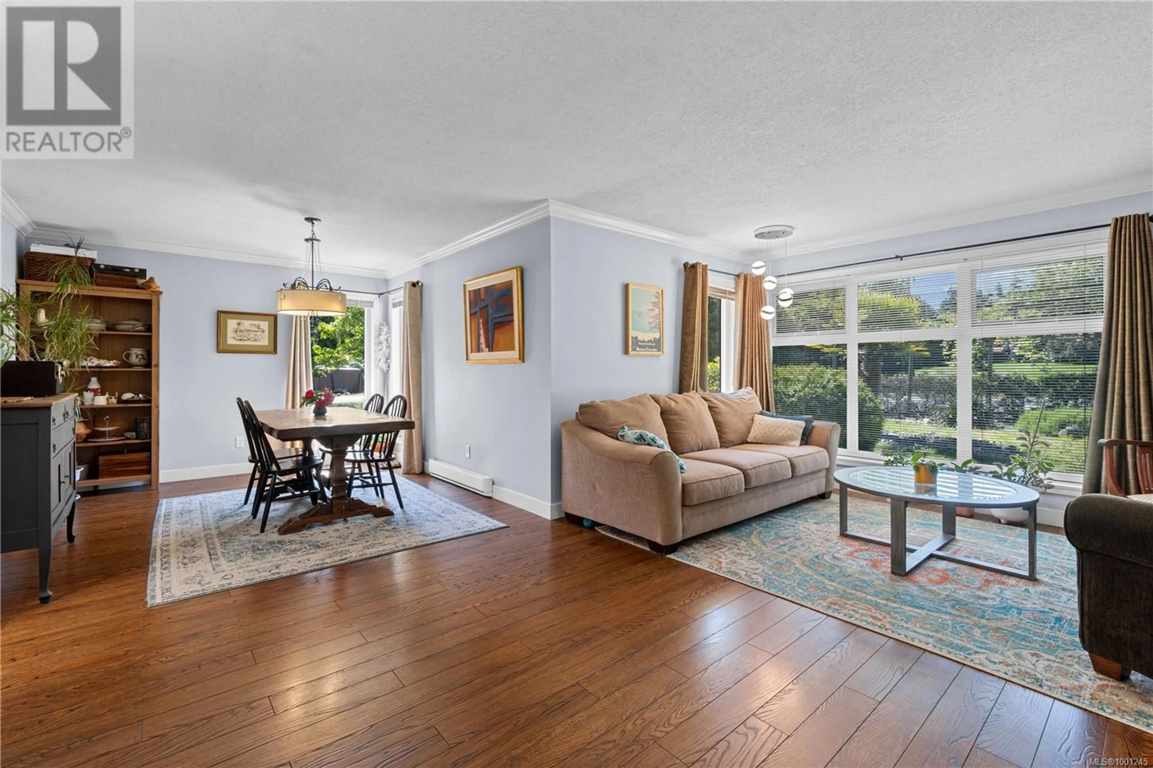 Living room with furniture, unknown for 667 TAMARACK DRIVE, Qualicum Beach British Columbia V9K1A8