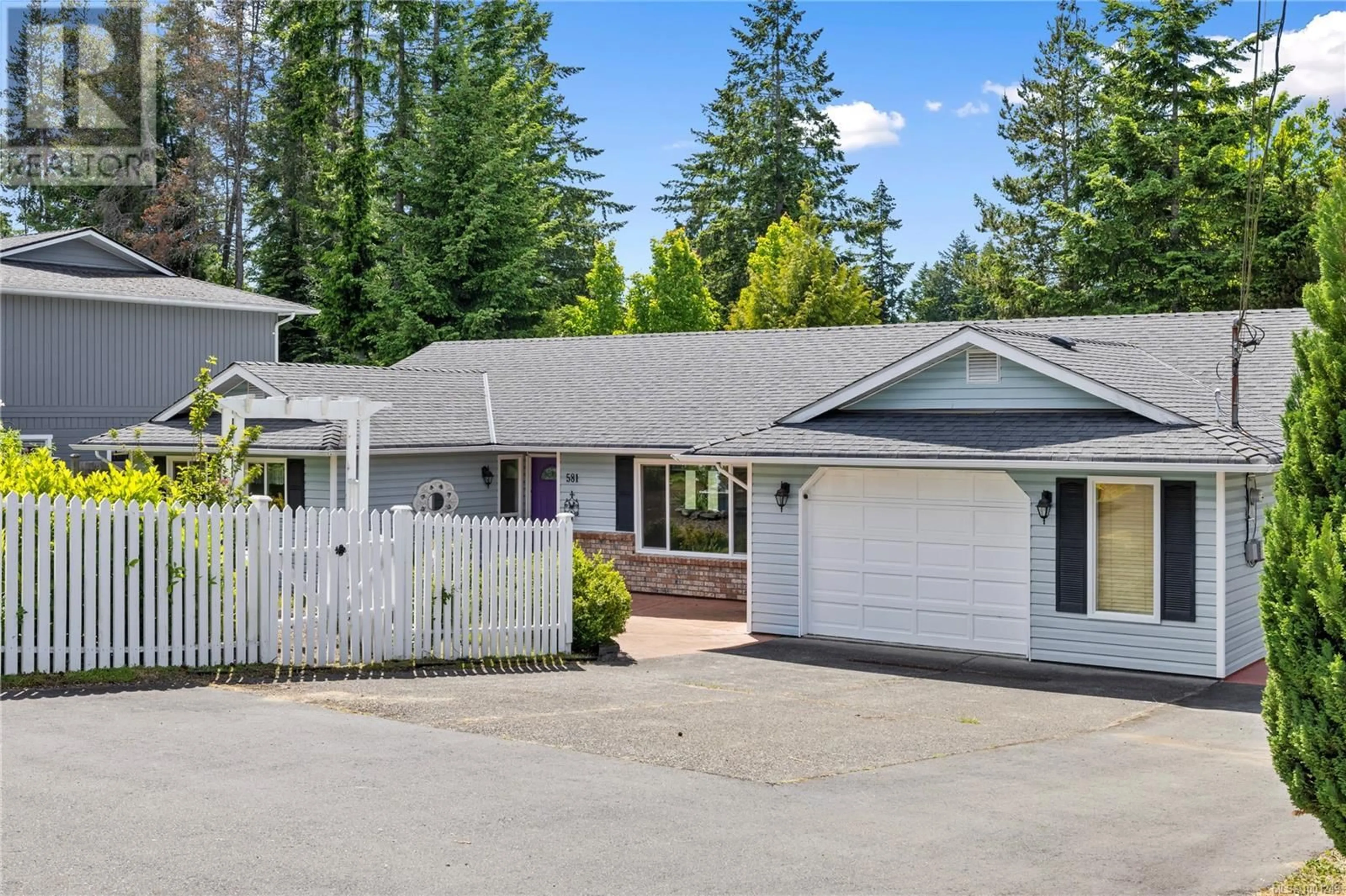 Home with vinyl exterior material, street for 581 ASPEN AVENUE, Qualicum Beach British Columbia V0R1T0