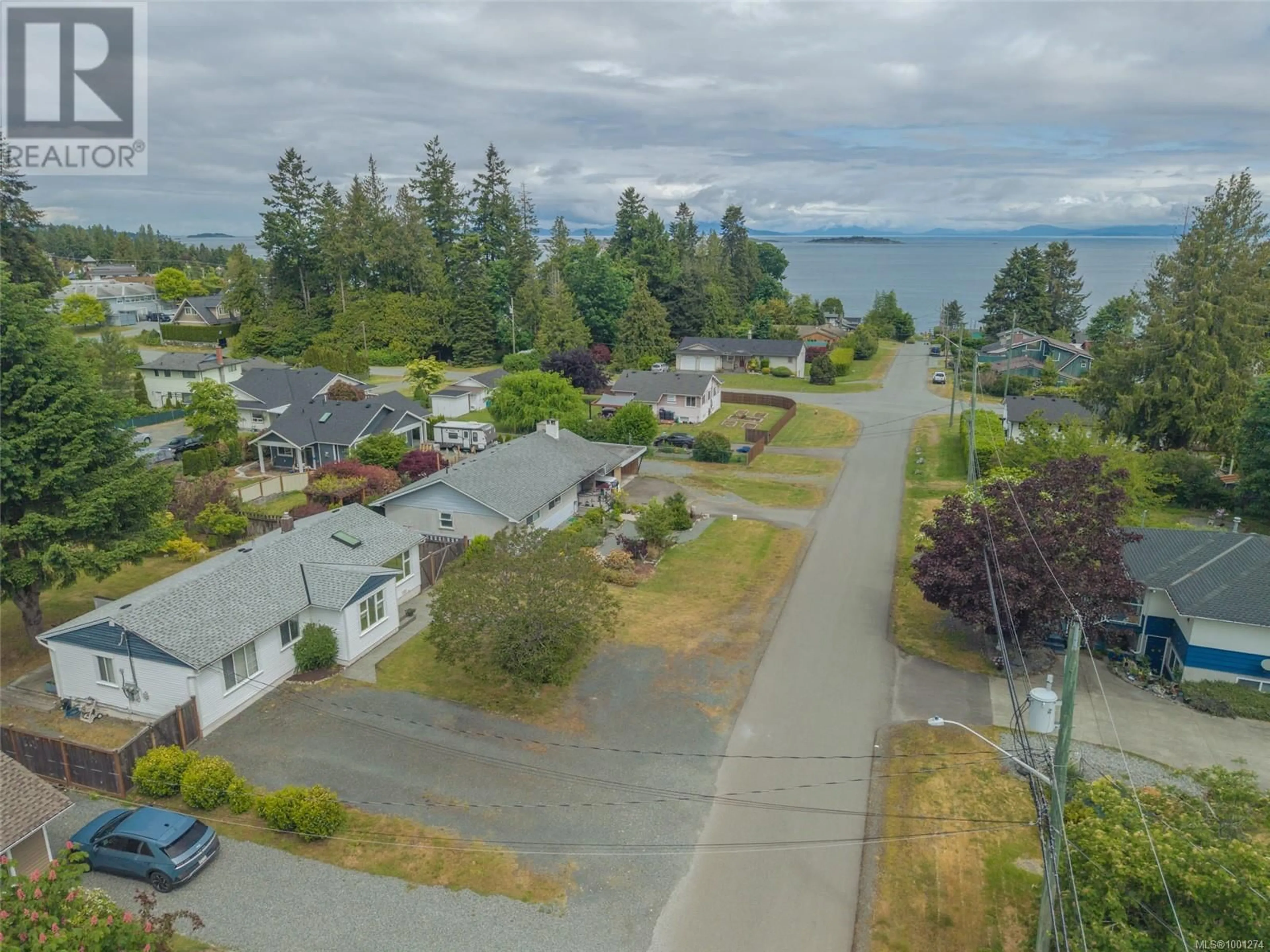 A pic from outside/outdoor area/front of a property/back of a property/a pic from drone, water/lake/river/ocean view for 6973 JACKS ROAD, Lantzville British Columbia V0R2H0