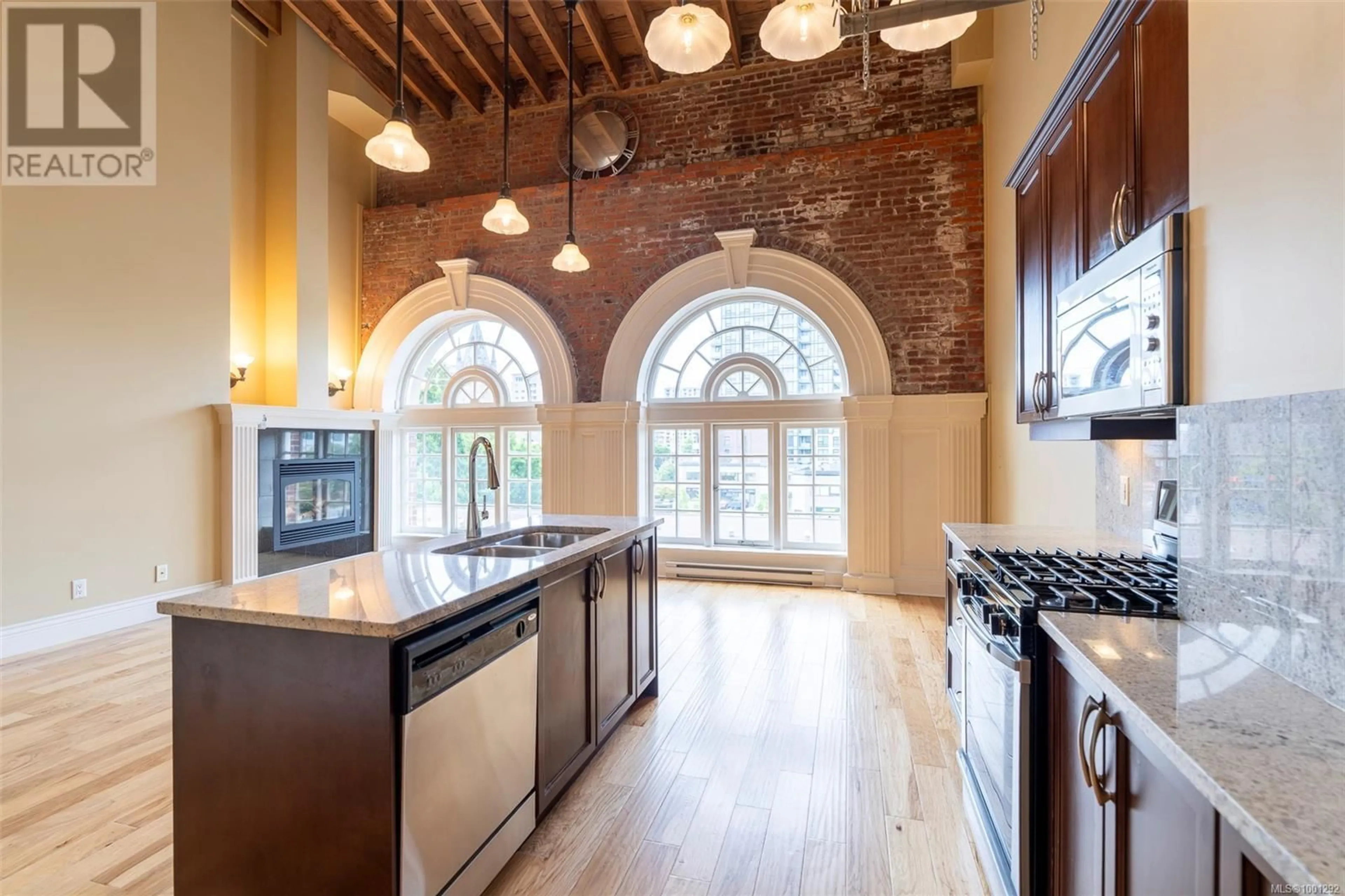 Open concept kitchen, ceramic/tile floor for 408 - 1602 QUADRA STREET, Victoria British Columbia V8W2L4