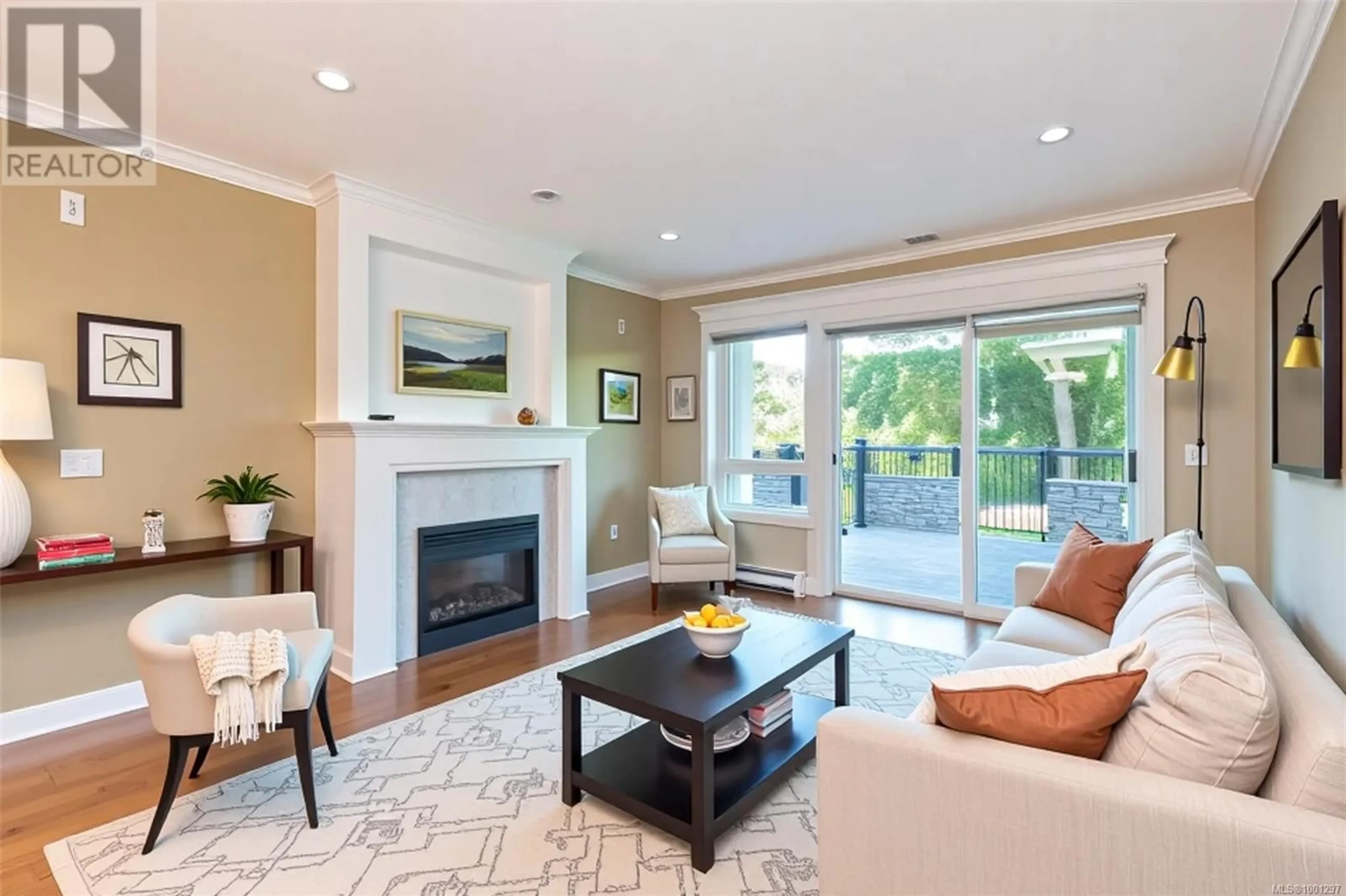 Living room with furniture, unknown for 106 - 537 HEATHERDALE LANE, Saanich British Columbia V8Z0A4