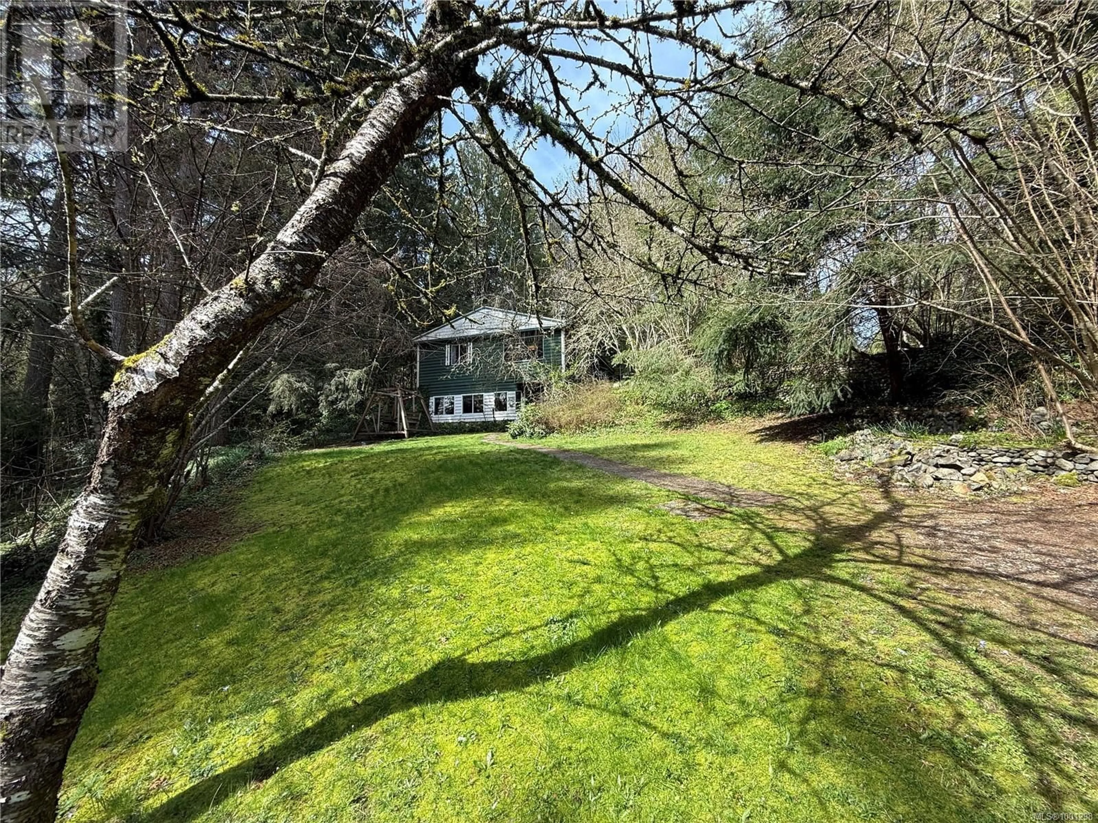 A pic from outside/outdoor area/front of a property/back of a property/a pic from drone, forest/trees view for 6756 DOUMONT ROAD, Nanaimo British Columbia V9T6H1