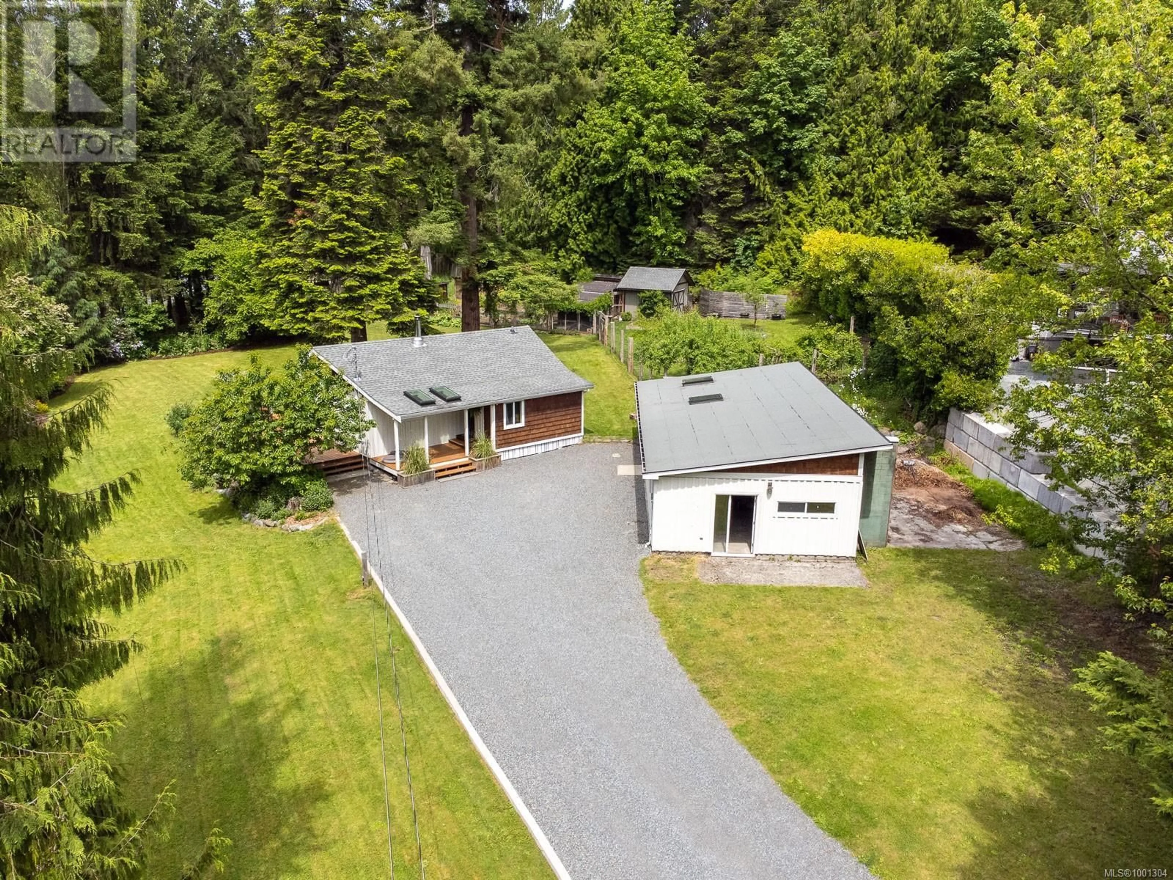 A pic from outside/outdoor area/front of a property/back of a property/a pic from drone, street for 1588 RUGG ROAD, Nanaimo British Columbia V9X1N1