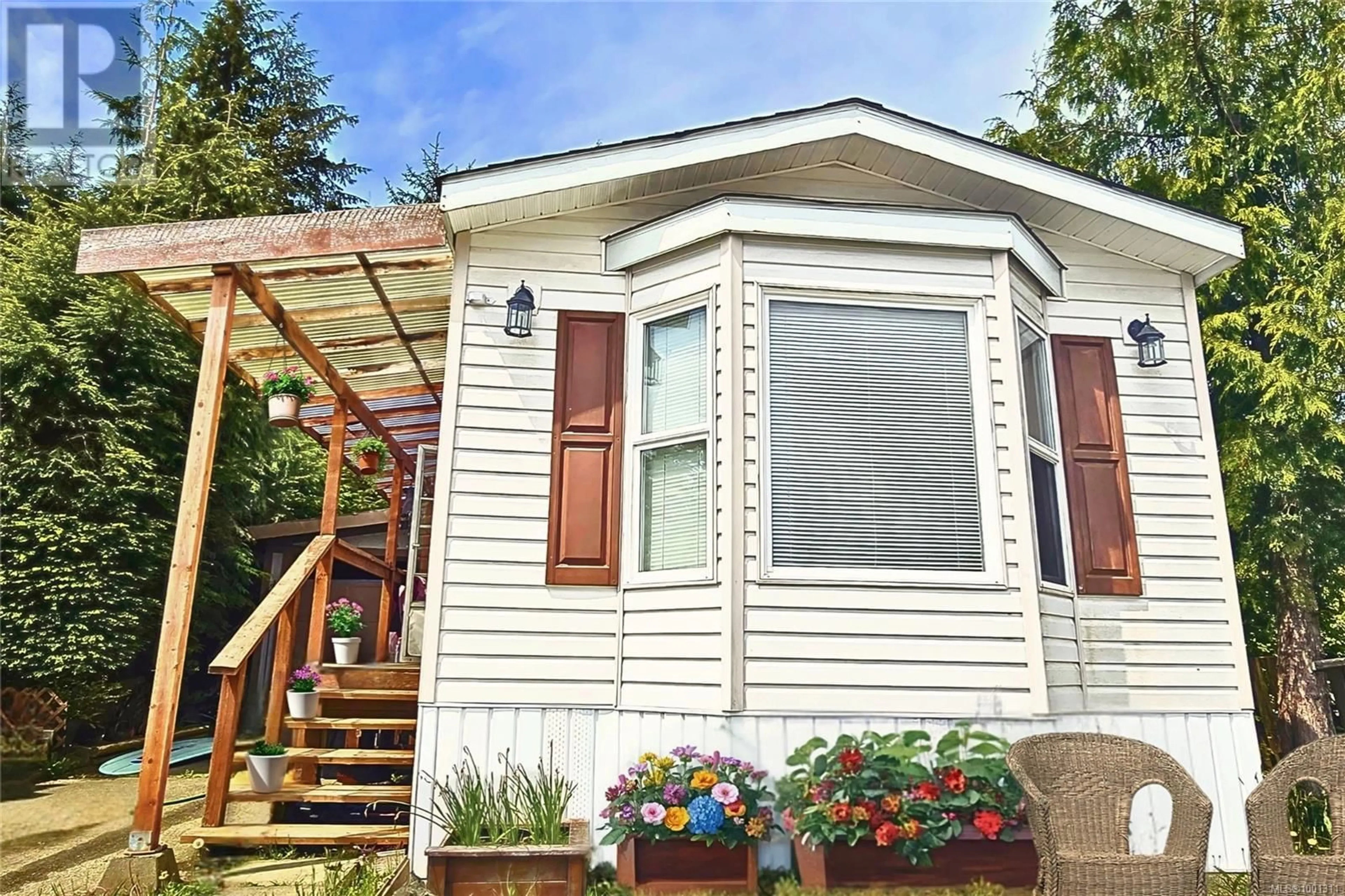 Home with vinyl exterior material, street for 1 - 2370 PACIFIC RIM HIGHWAY, Port Albion British Columbia V0R3A0