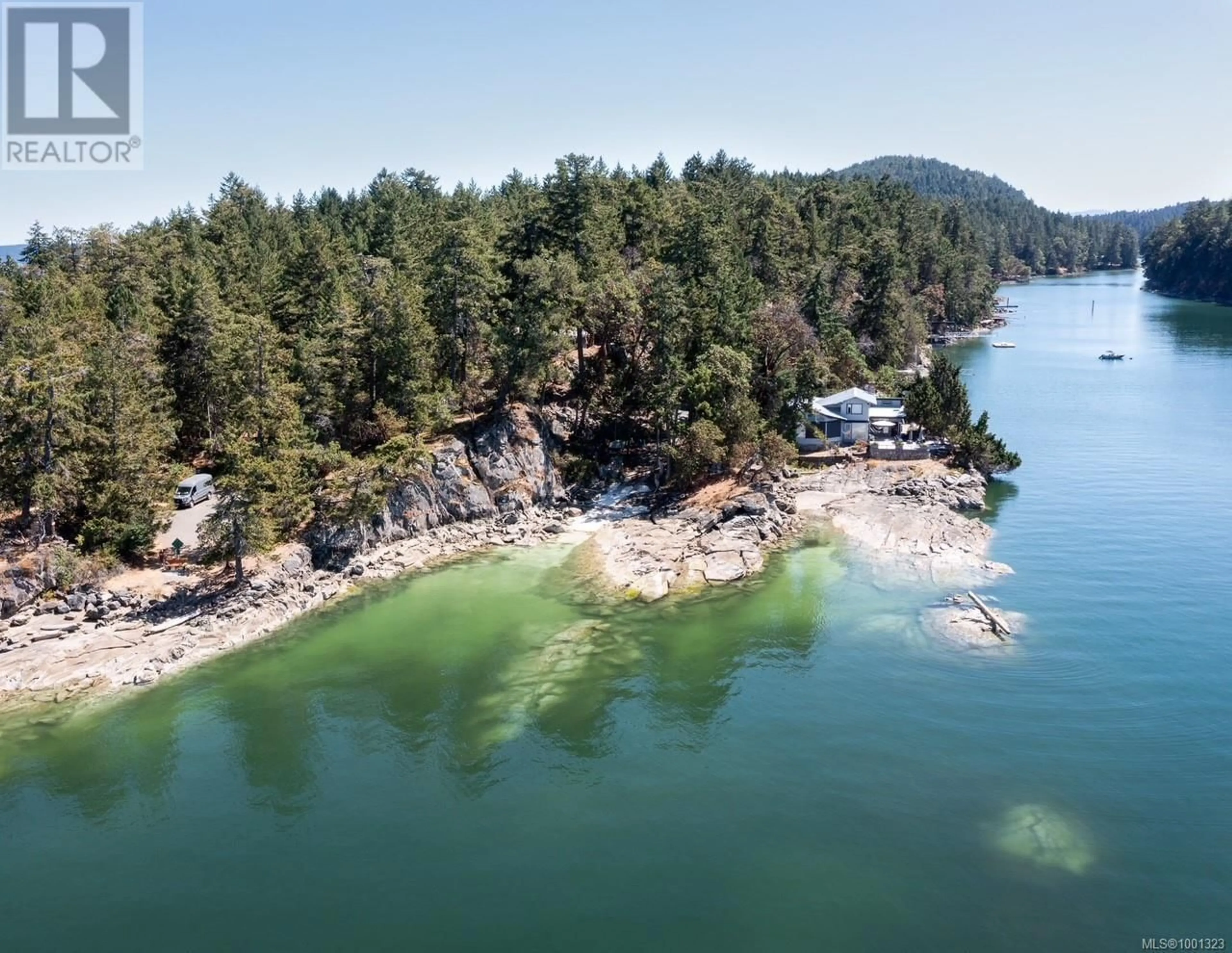 A pic from outside/outdoor area/front of a property/back of a property/a pic from drone, water/lake/river/ocean view for 217 PILKEY POINT ROAD, Thetis Island British Columbia V0R2Y0