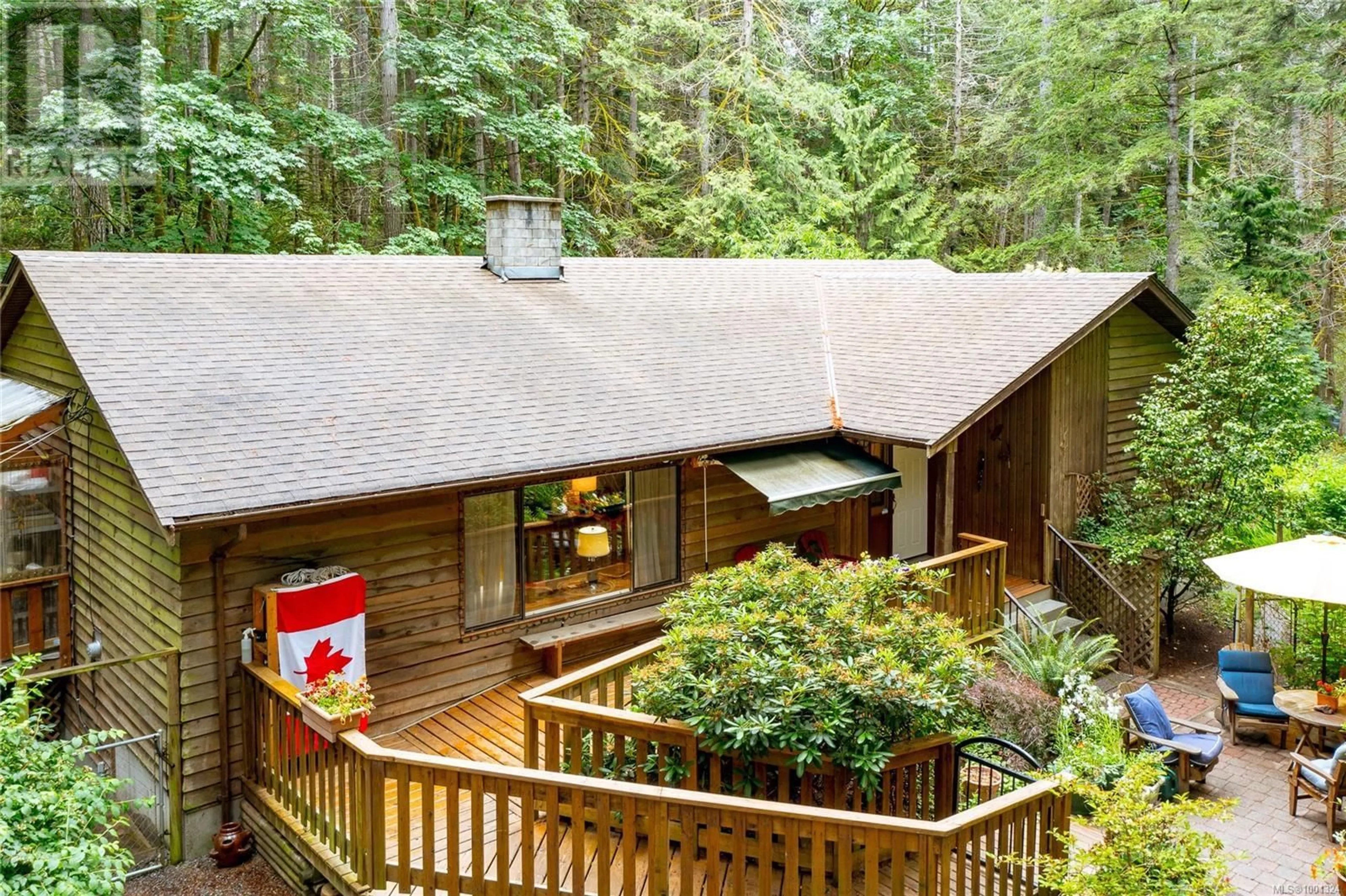 A pic from outside/outdoor area/front of a property/back of a property/a pic from drone, forest/trees view for 3345 MCGUIRE WAY, Nanaimo British Columbia V0R2E0