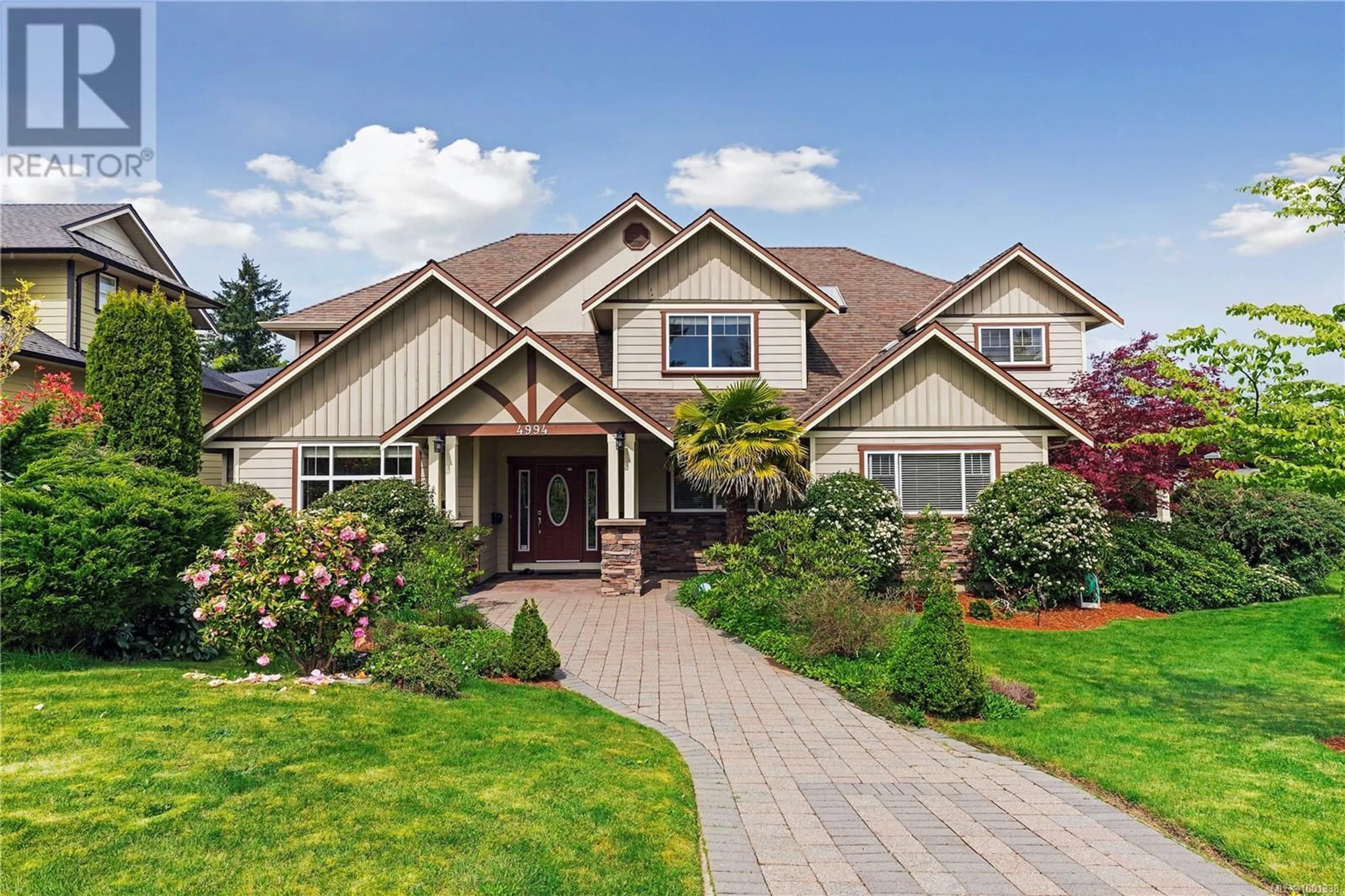 Home with brick exterior material, street for 4994 LA QUINTA PLACE, Saanich British Columbia V8Y3G9