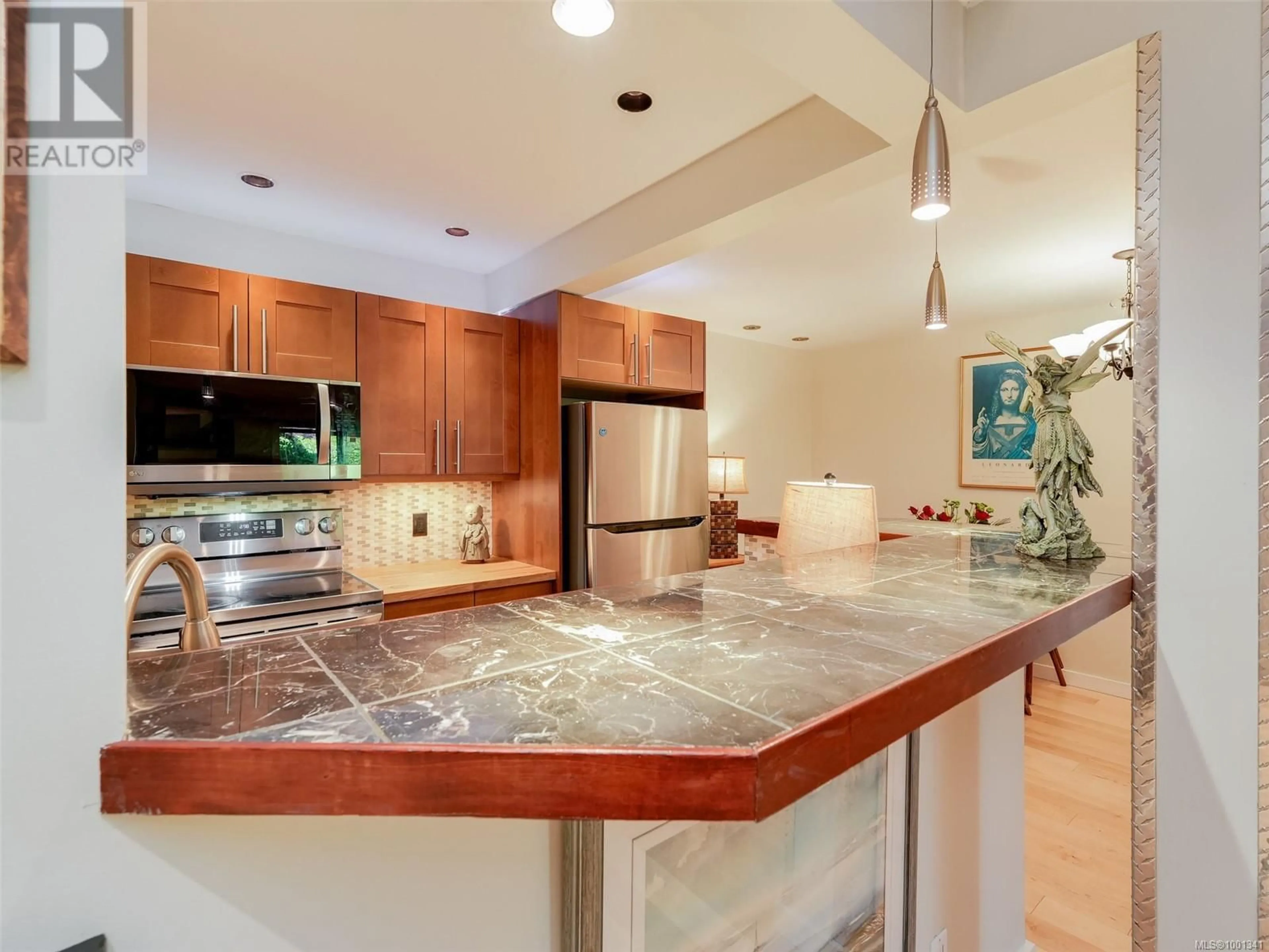 Contemporary kitchen, ceramic/tile floor for 108 - 1419 STADACONA AVENUE, Victoria British Columbia V8S5J3
