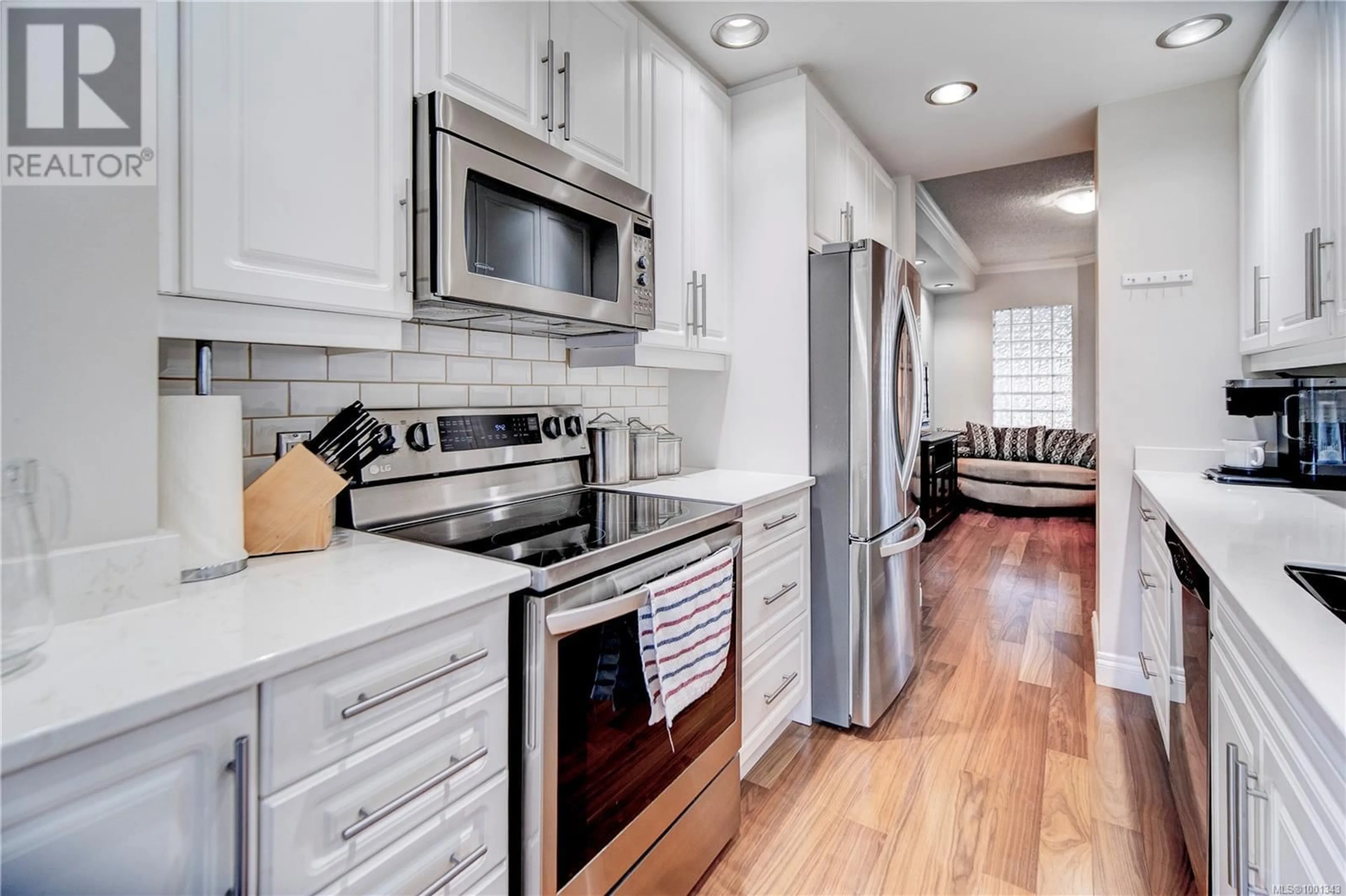 Open concept kitchen, ceramic/tile floor for 212 - 205 KIMTA ROAD, Victoria British Columbia V9A6T5