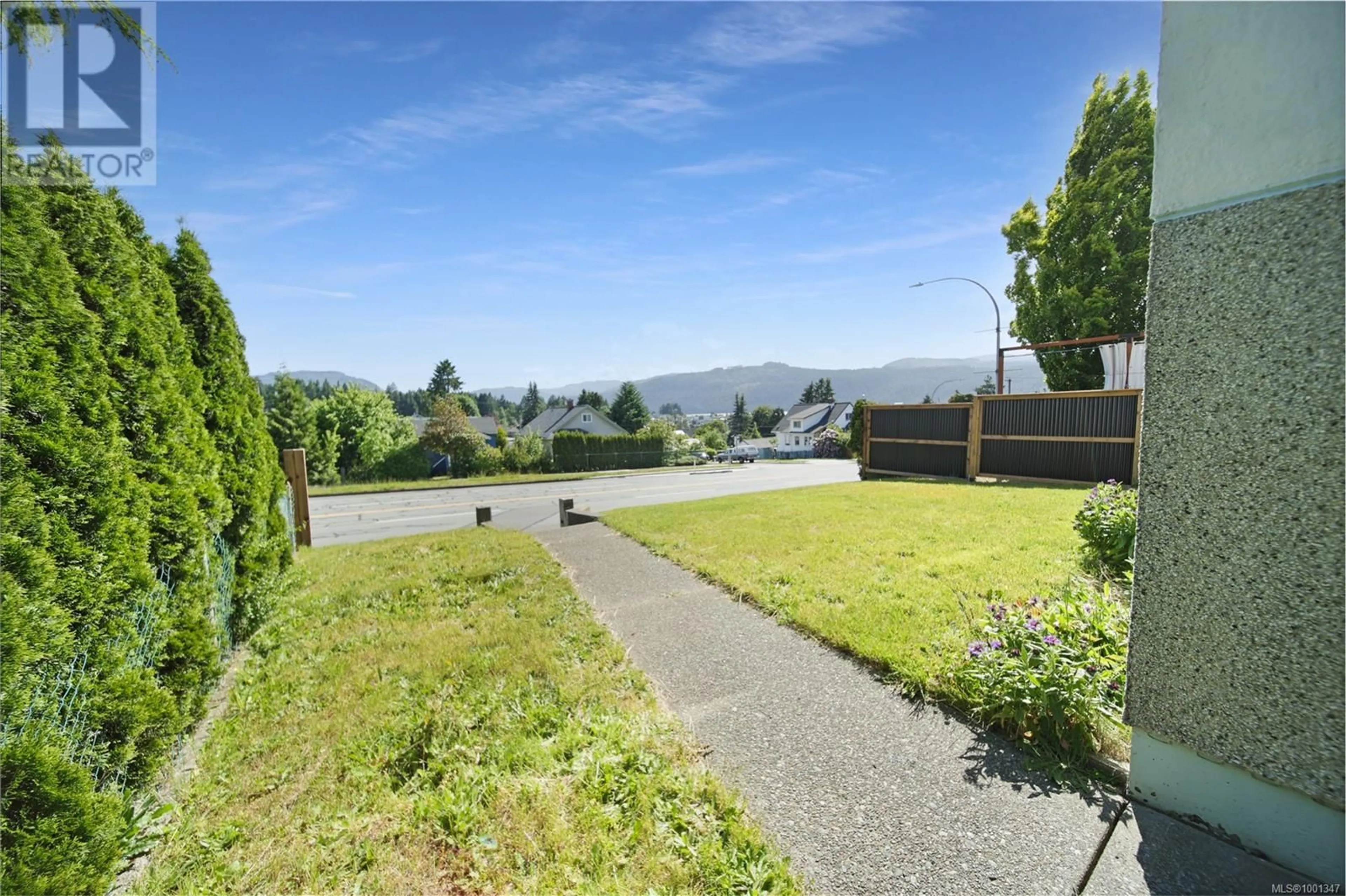 A pic from outside/outdoor area/front of a property/back of a property/a pic from drone, mountain view for 4571 REDFORD STREET, Port Alberni British Columbia V9Y3P9