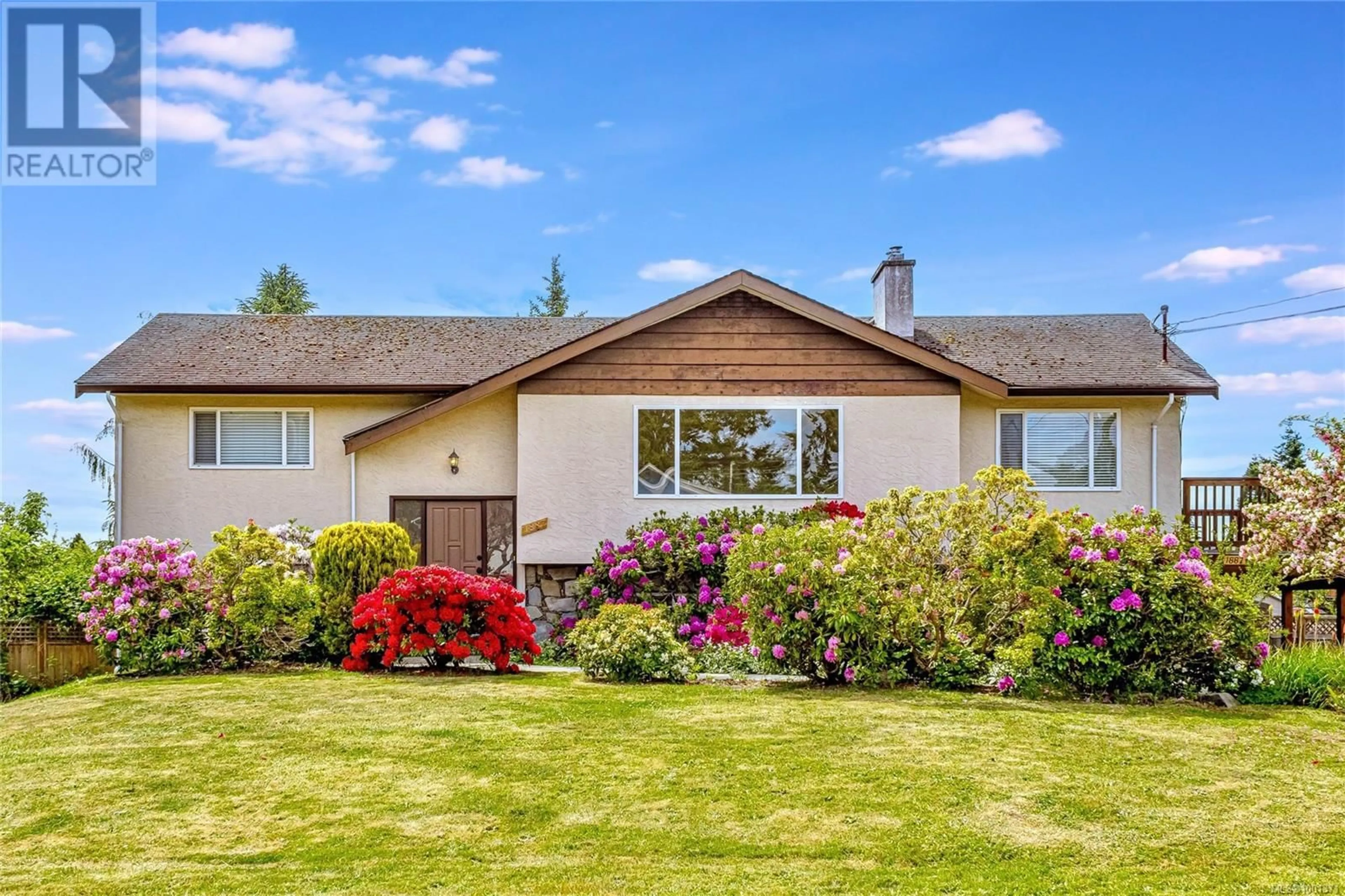 Home with vinyl exterior material, street for 1887 SAN PEDRO AVENUE, Saanich British Columbia V8N2G7