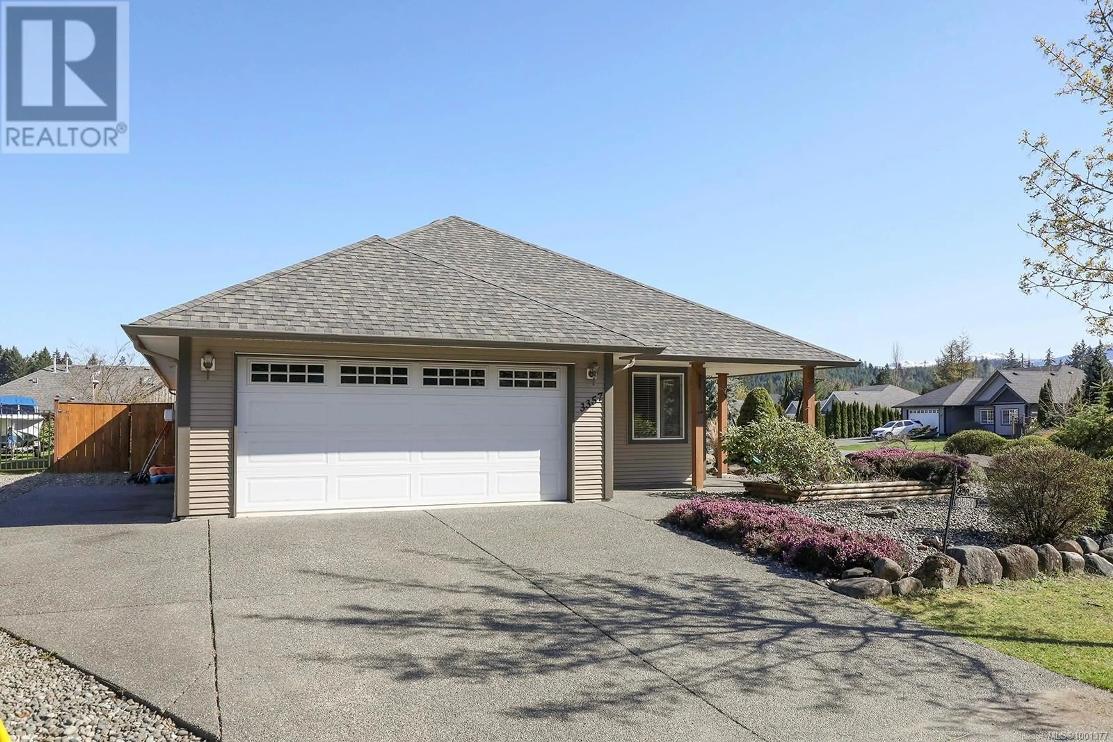 Home with vinyl exterior material, street for 3357 MILL STREET, Cumberland British Columbia V0R1S0