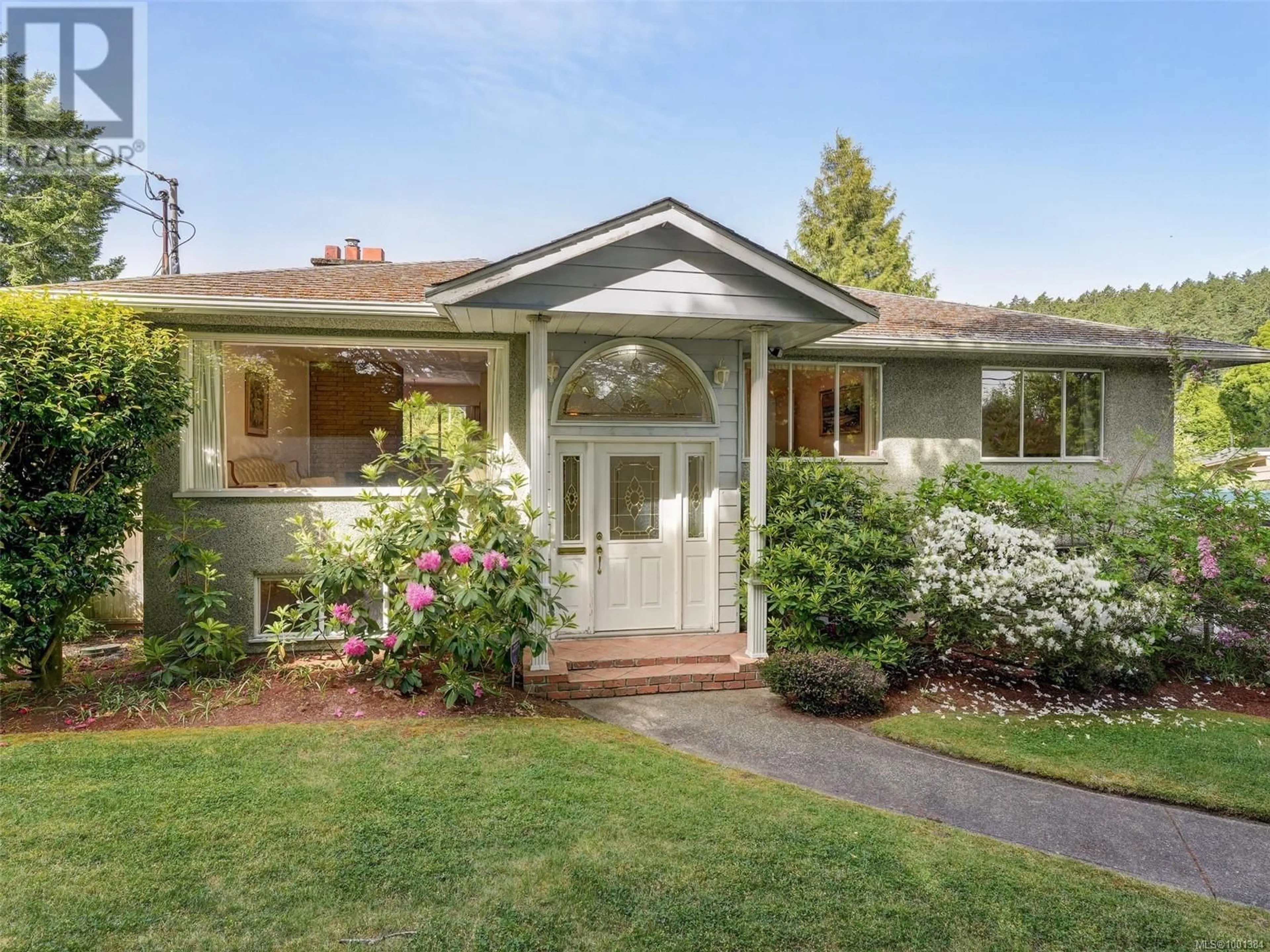 Home with vinyl exterior material, street for 4320 CEDAR HILL ROAD, Saanich British Columbia V8N3C5