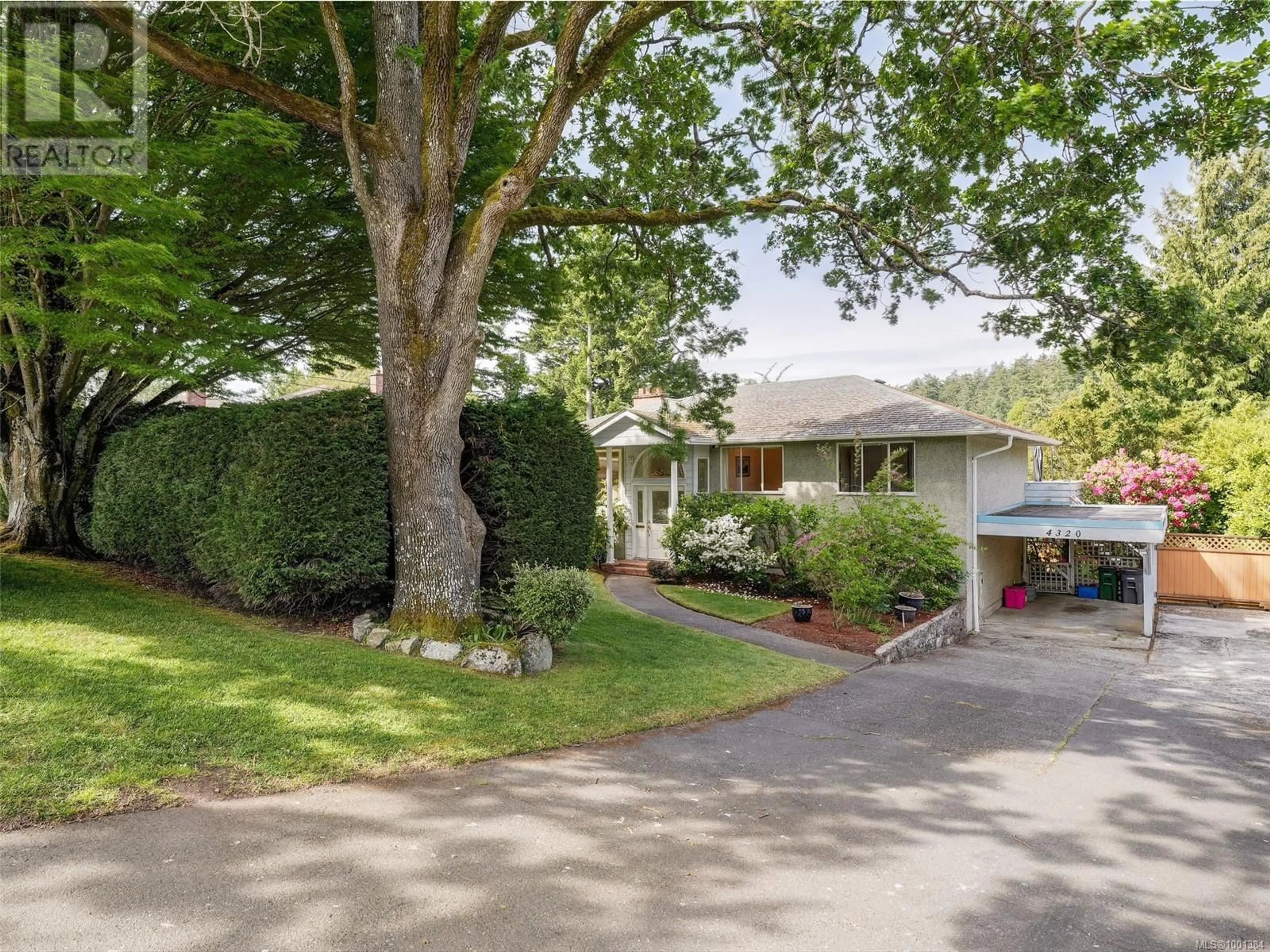 A pic from outside/outdoor area/front of a property/back of a property/a pic from drone, street for 4320 CEDAR HILL ROAD, Saanich British Columbia V8N3C5