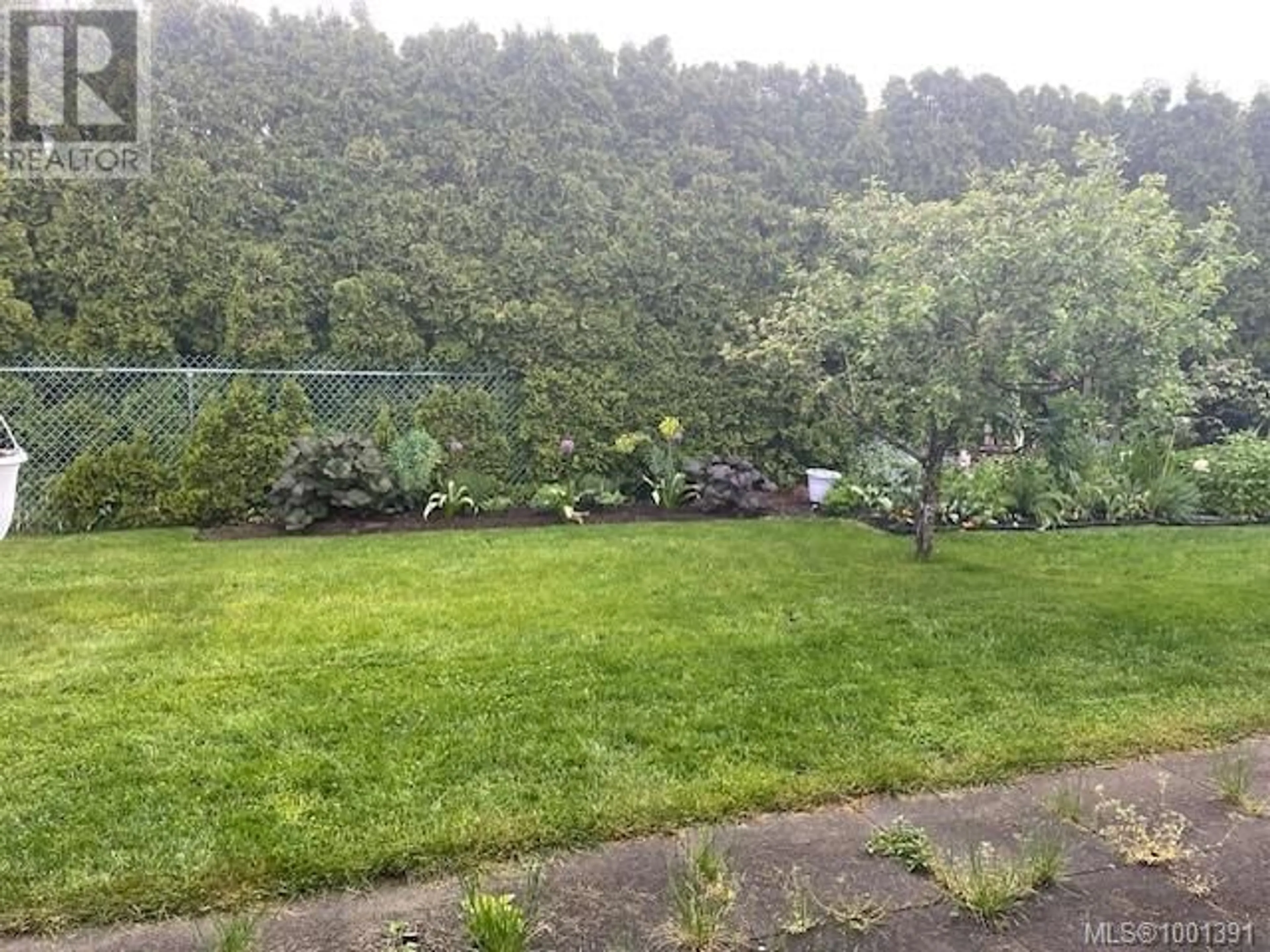 A pic from outside/outdoor area/front of a property/back of a property/a pic from drone, forest/trees view for 210 - 1537 NOEL AVENUE, Comox British Columbia V9M3H8