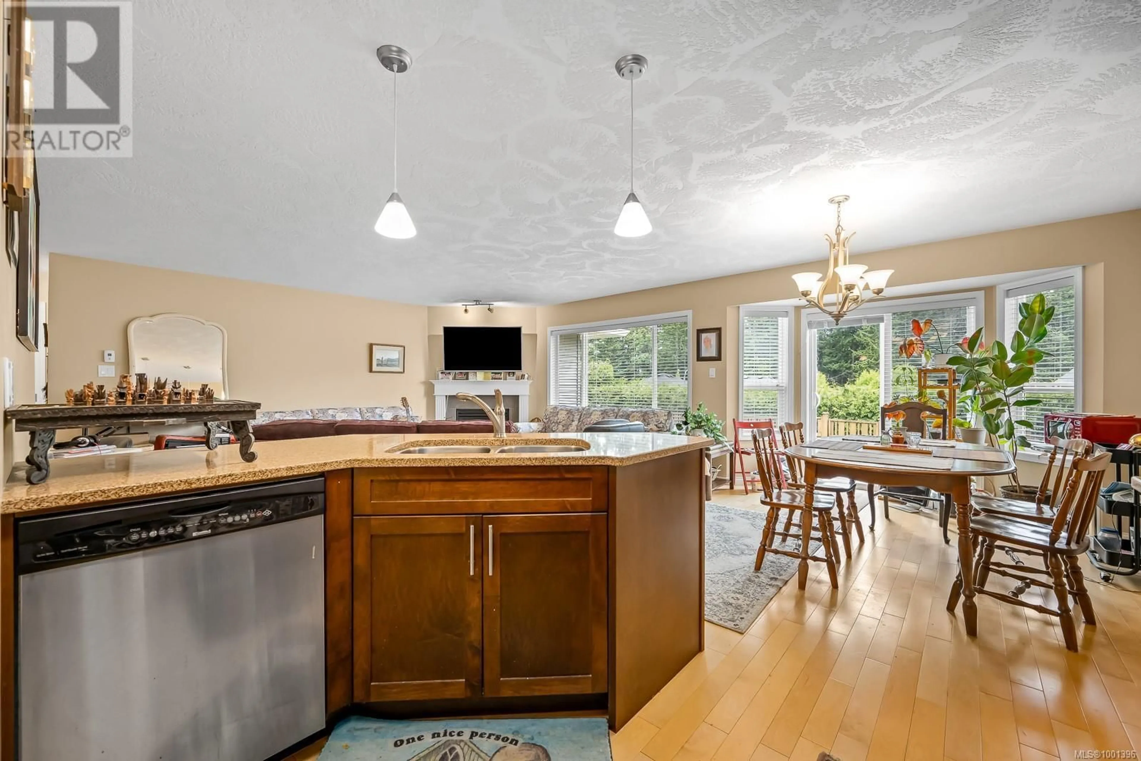 Open concept kitchen, ceramic/tile floor for 2480 AVRO ARROW DRIVE, Comox British Columbia V9M0A6