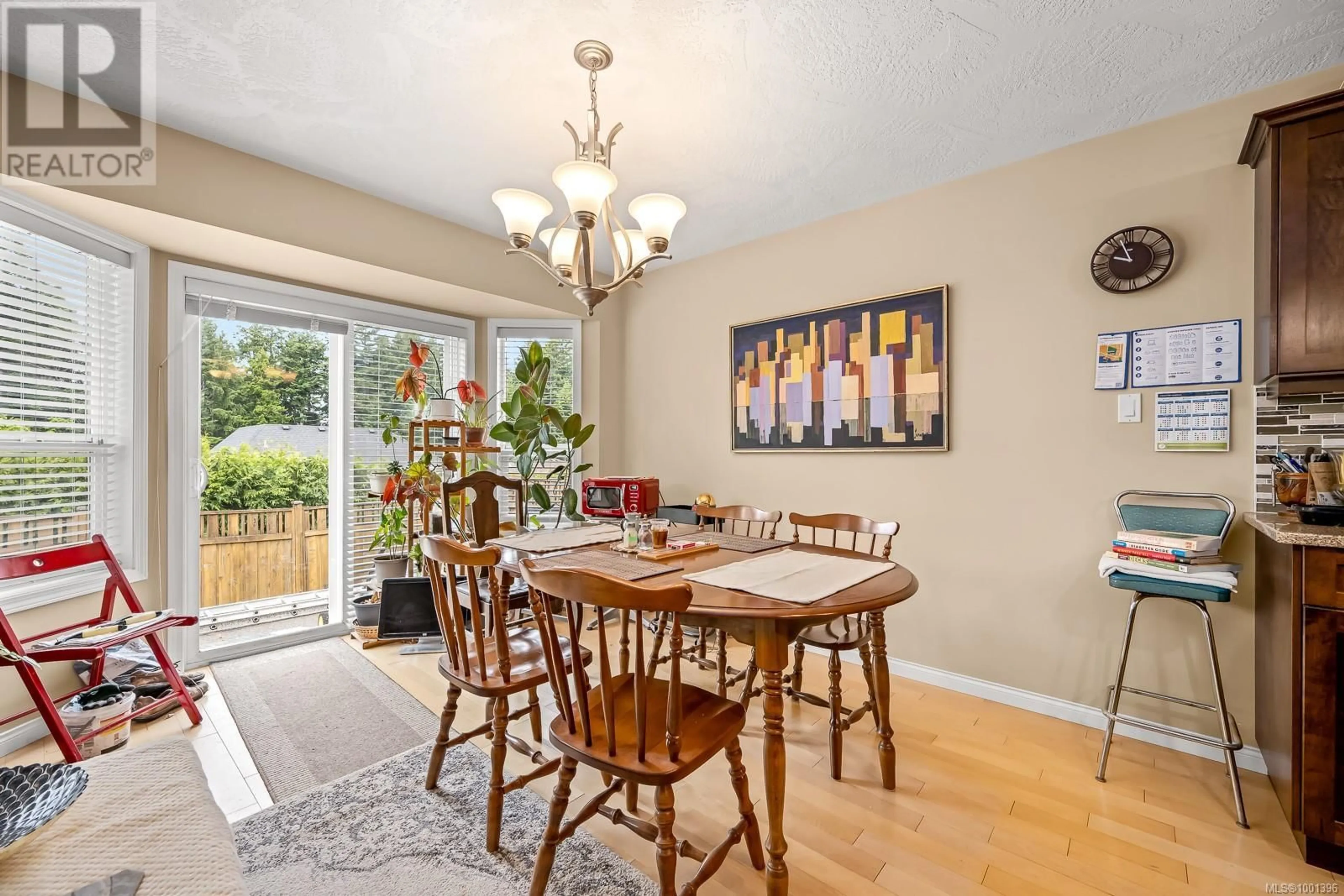 Dining room, wood/laminate floor for 2480 AVRO ARROW DRIVE, Comox British Columbia V9M0A6