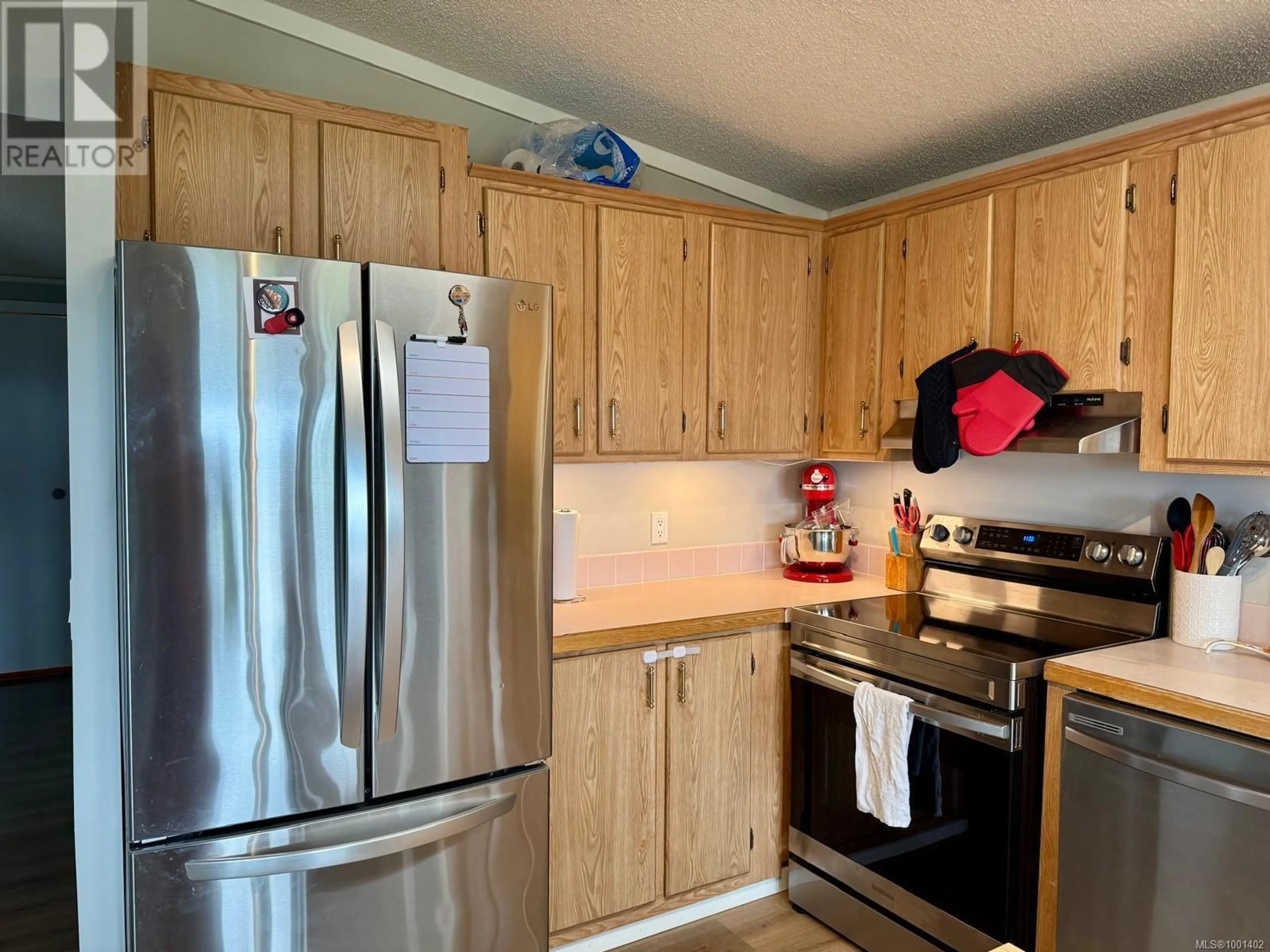 Standard kitchen, wood/laminate floor for 1792 JORDAN PLACE, Port McNeill British Columbia V0N2R0