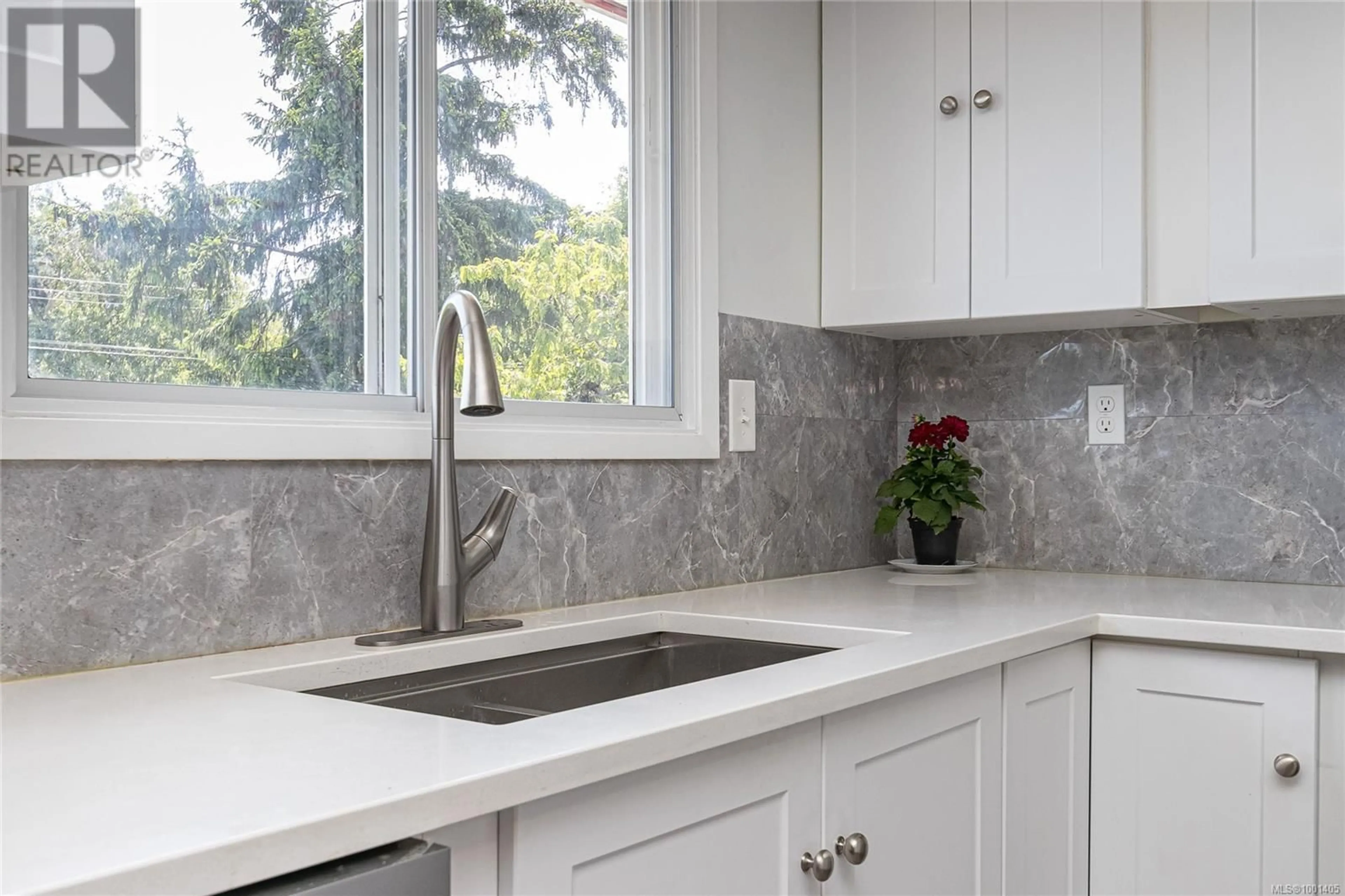 Contemporary kitchen, ceramic/tile floor for 3973 BIRCHWOOD STREET, Saanich British Columbia V8N3L9