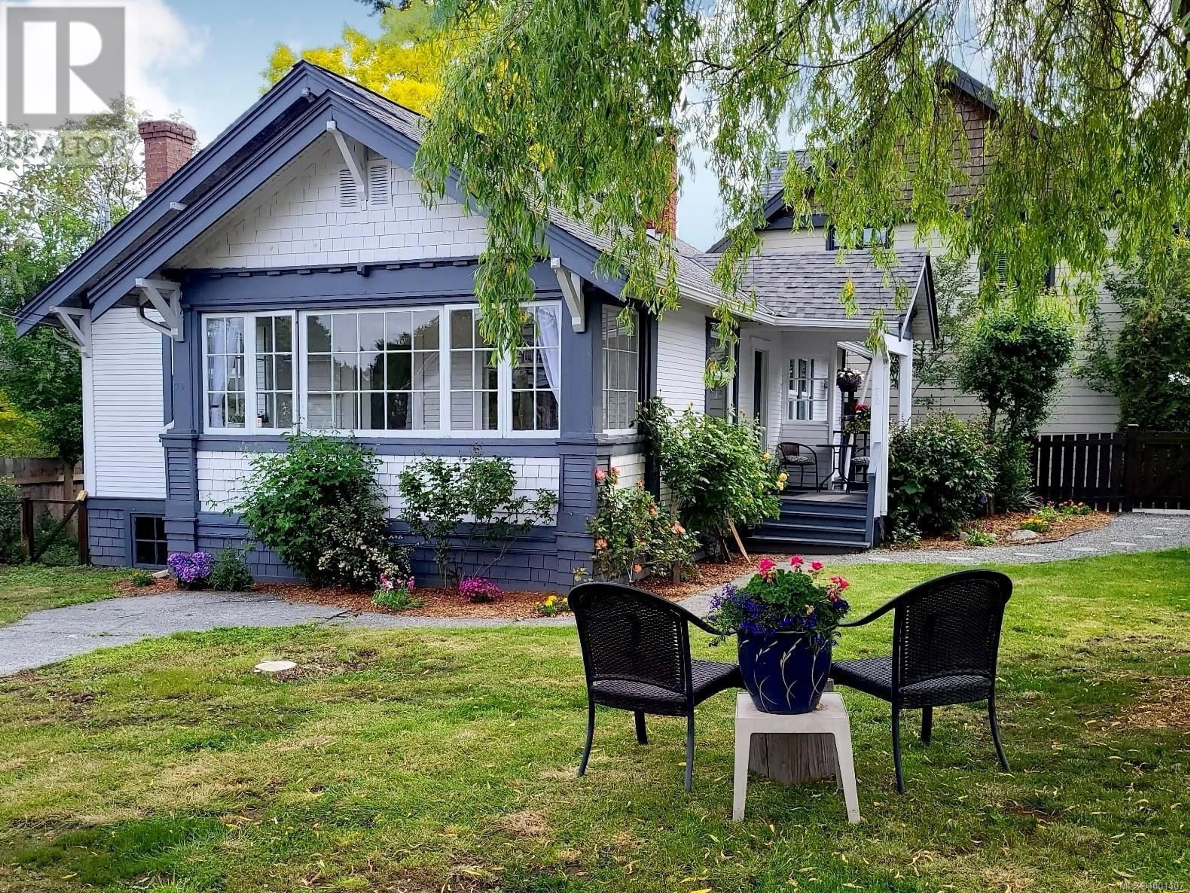 A pic from outside/outdoor area/front of a property/back of a property/a pic from drone, street for 70 KENNEDY STREET, Nanaimo British Columbia V9R2H6