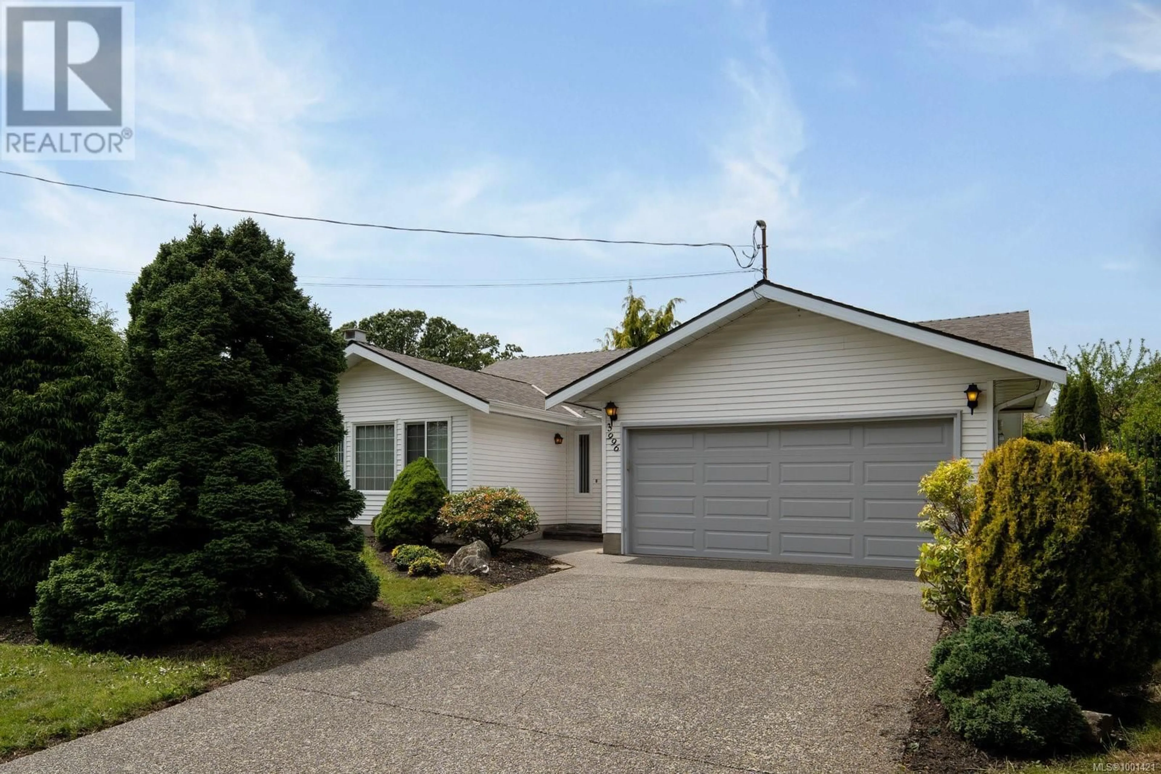 Home with vinyl exterior material, street for 3996 CEDAR HILL ROAD, Saanich British Columbia V8N3C1