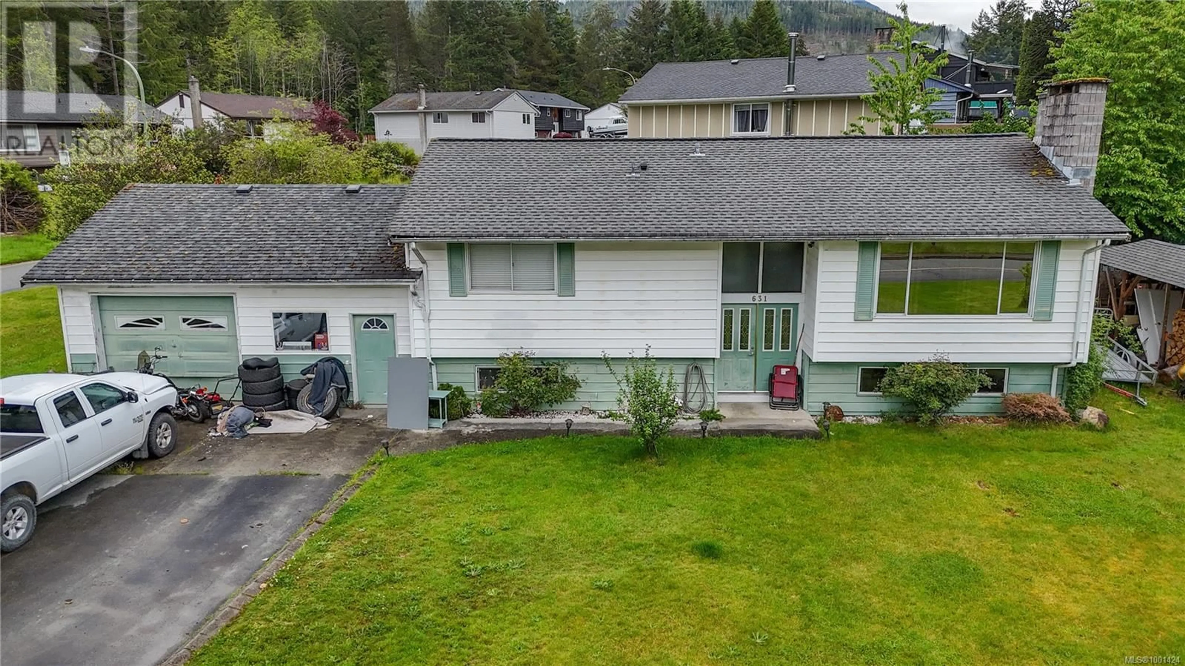 A pic from outside/outdoor area/front of a property/back of a property/a pic from drone, street for 631 NIMPKISH DRIVE, Gold River British Columbia V0P1G0