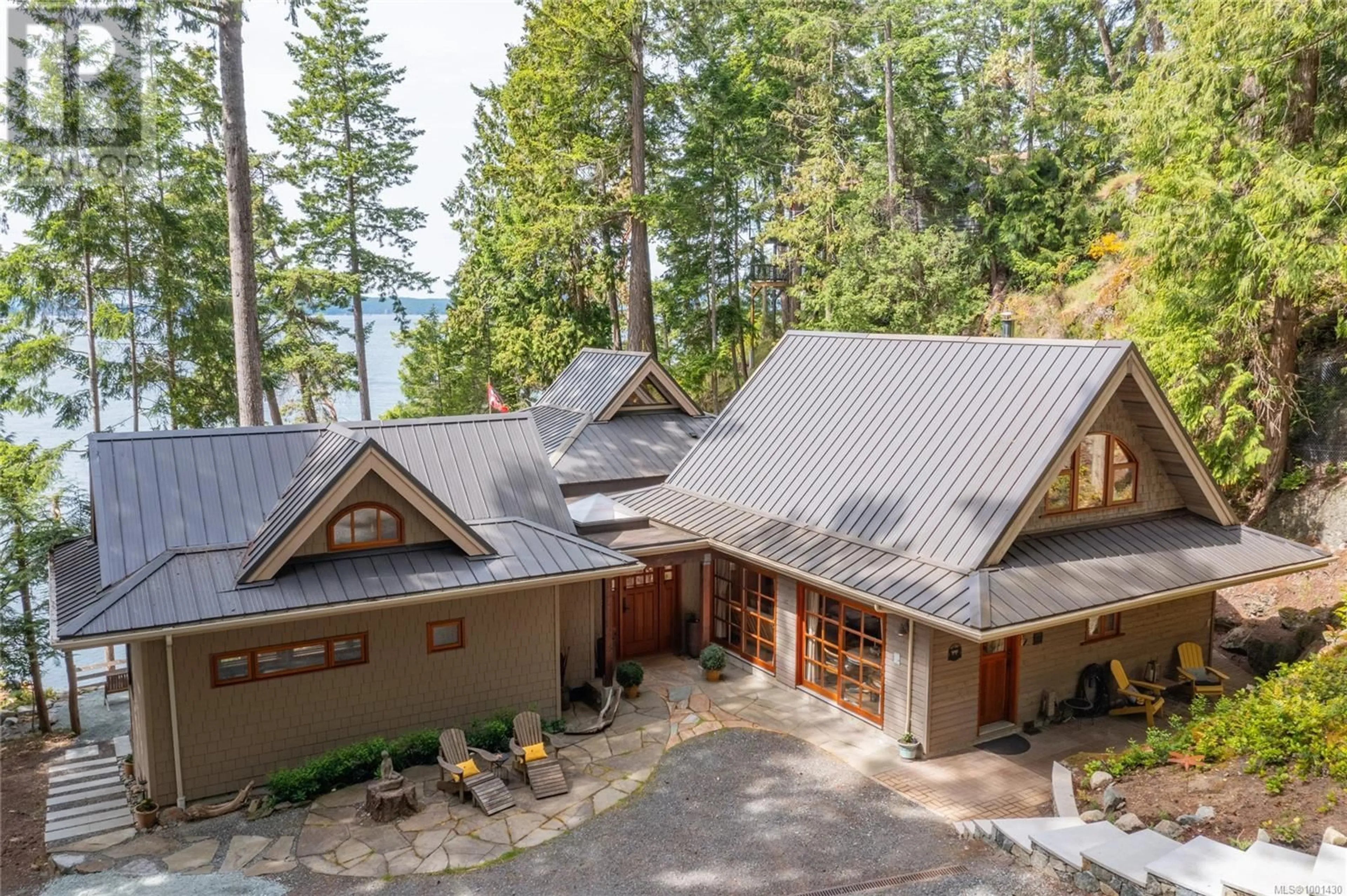 A pic from outside/outdoor area/front of a property/back of a property/a pic from drone, water/lake/river/ocean view for 1604 STORM CRESCENT, Pender Island British Columbia V0N2M2