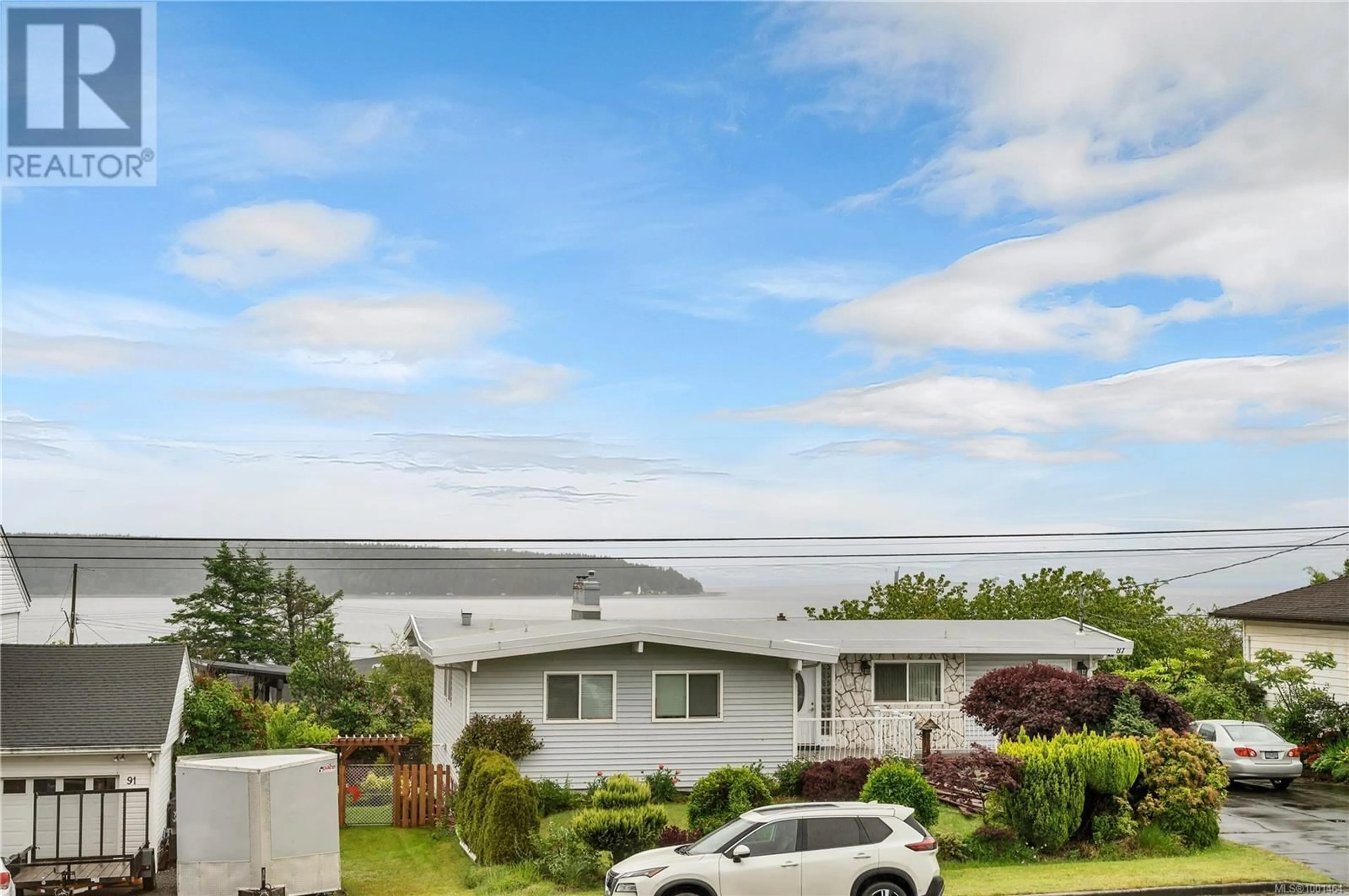 A pic from outside/outdoor area/front of a property/back of a property/a pic from drone, water/lake/river/ocean view for 90 THULIN STREET, Campbell River British Columbia V9W2K2