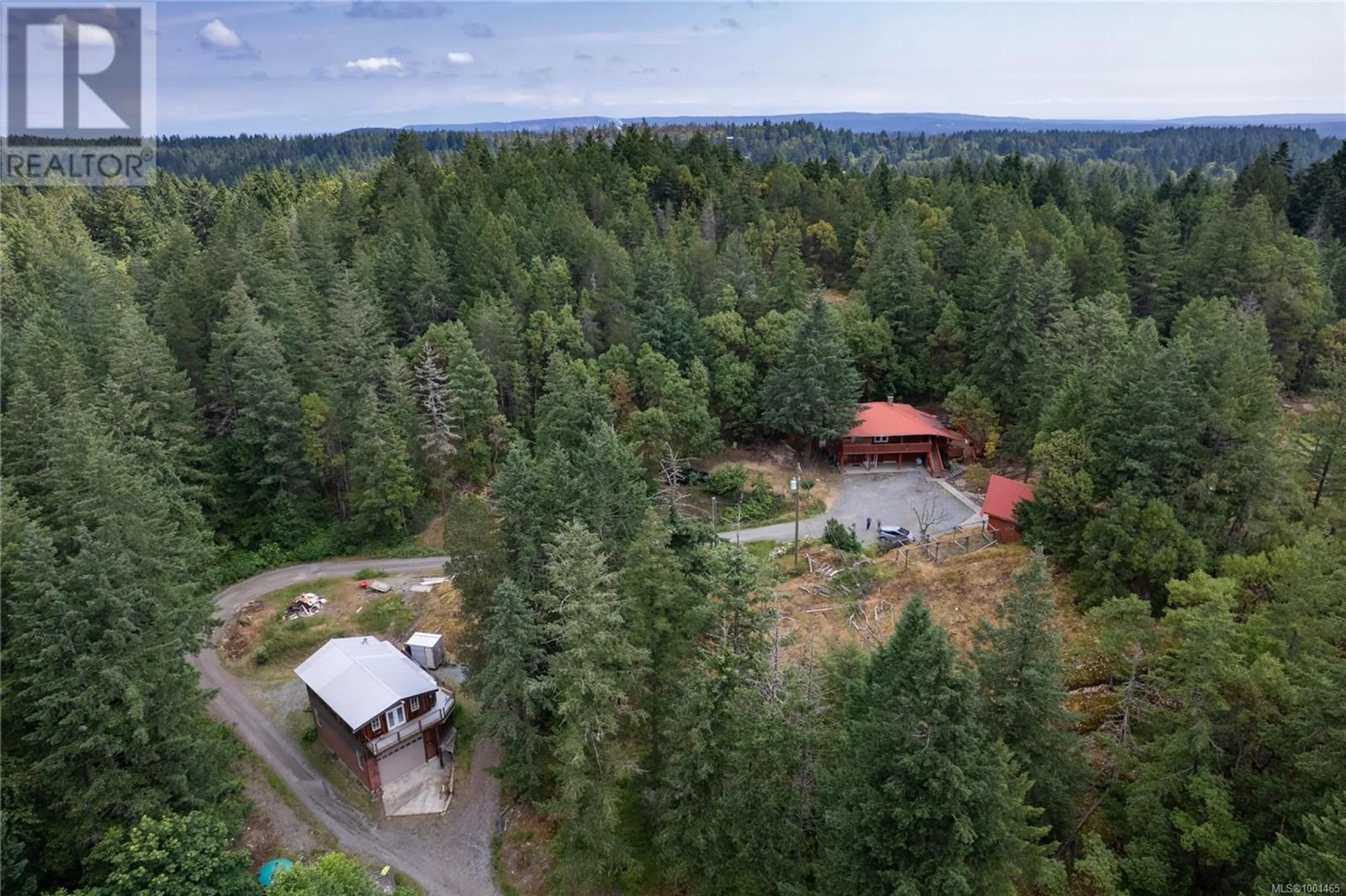 A pic from outside/outdoor area/front of a property/back of a property/a pic from drone, forest/trees view for 950 NANAIMO RIVER ROAD, Nanaimo British Columbia V9X1E5