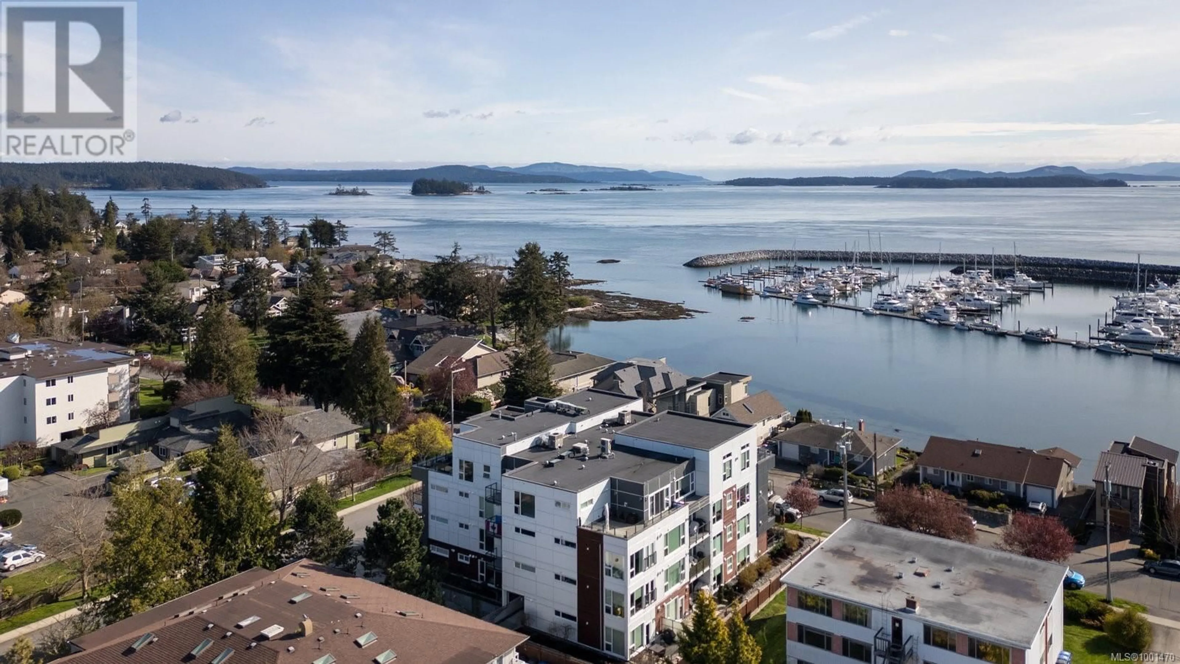 A pic from outside/outdoor area/front of a property/back of a property/a pic from drone, water/lake/river/ocean view for 206 - 2447 HENRY AVENUE, Sidney British Columbia V8L4N3