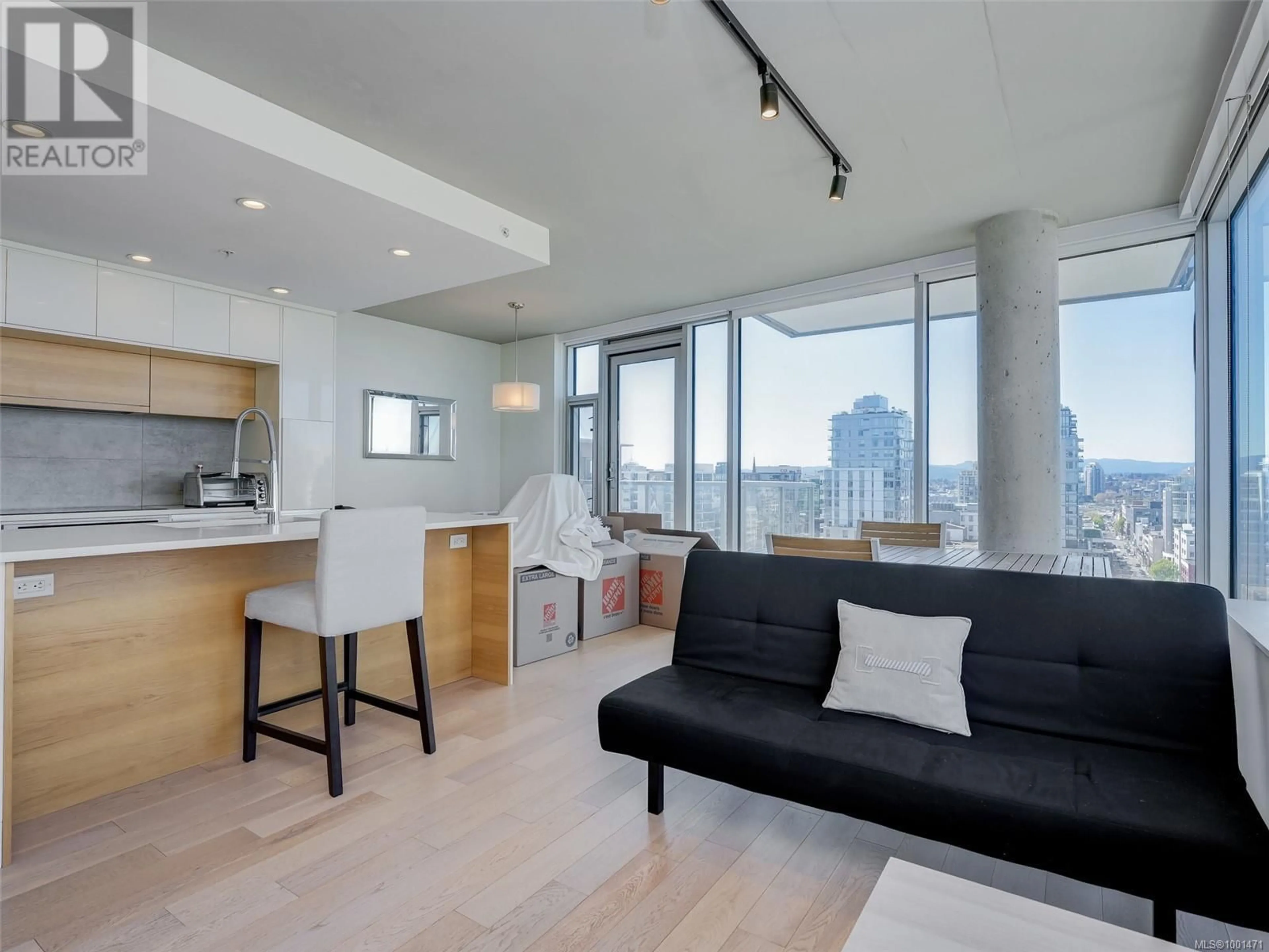 Living room with furniture, wood/laminate floor for 1404 - 989 JOHNSON STREET, Victoria British Columbia V8V0E3