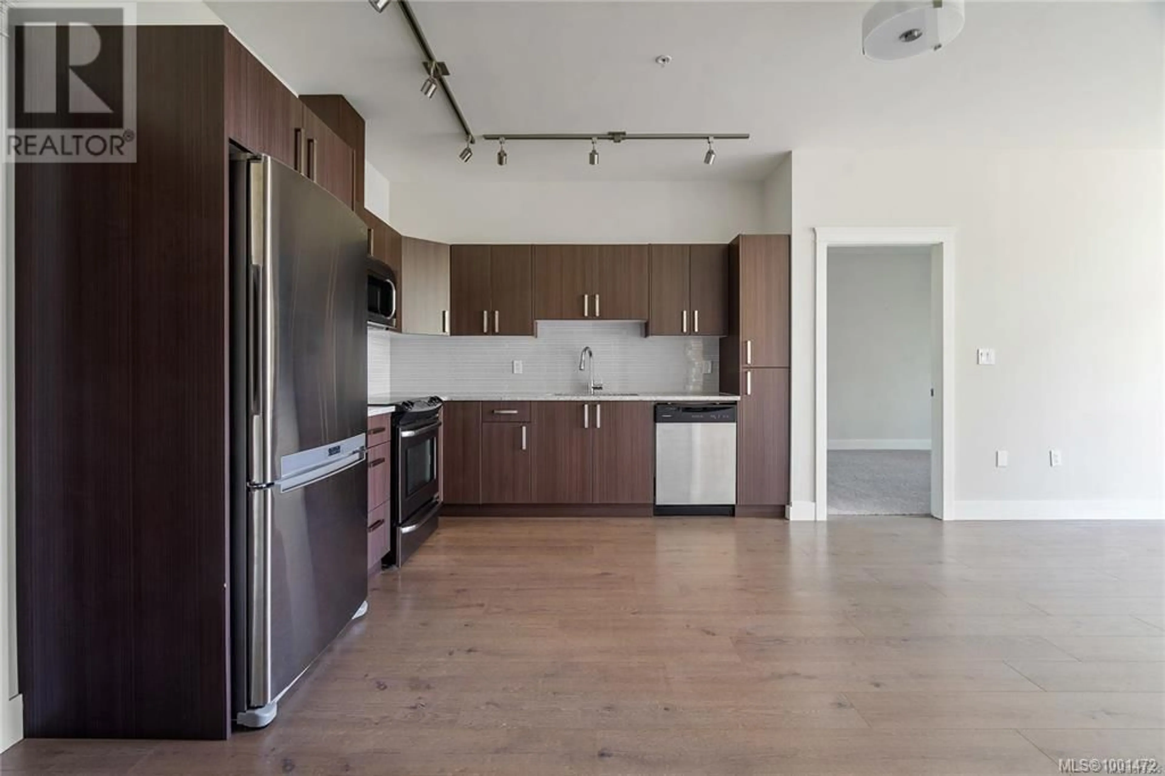 Open concept kitchen, unknown for 406 - 1900 WATKISS WAY, View Royal British Columbia V9B0S8