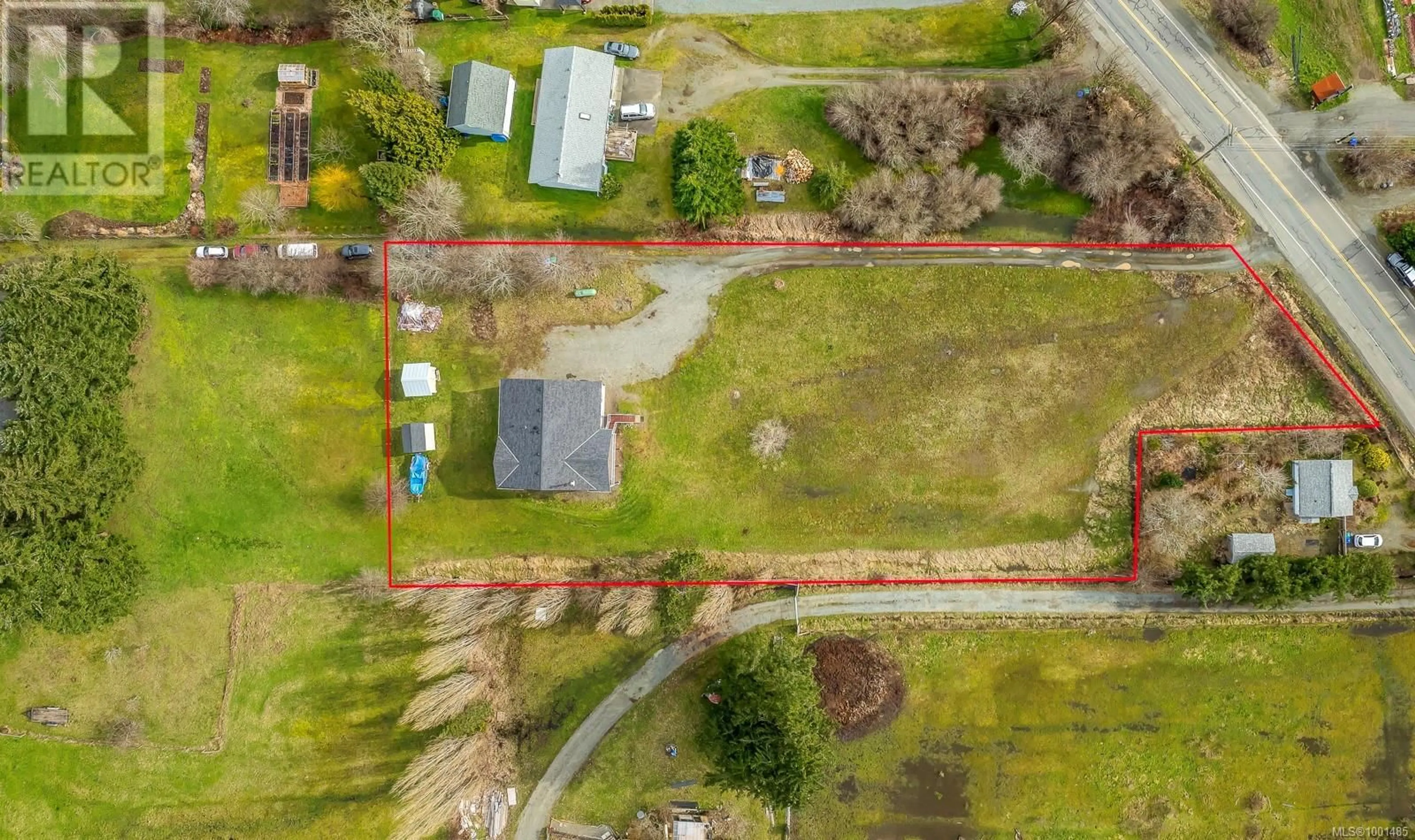 A pic from outside/outdoor area/front of a property/back of a property/a pic from drone, street for 4754 HEADQUARTERS ROAD, Courtenay British Columbia V9N9H4