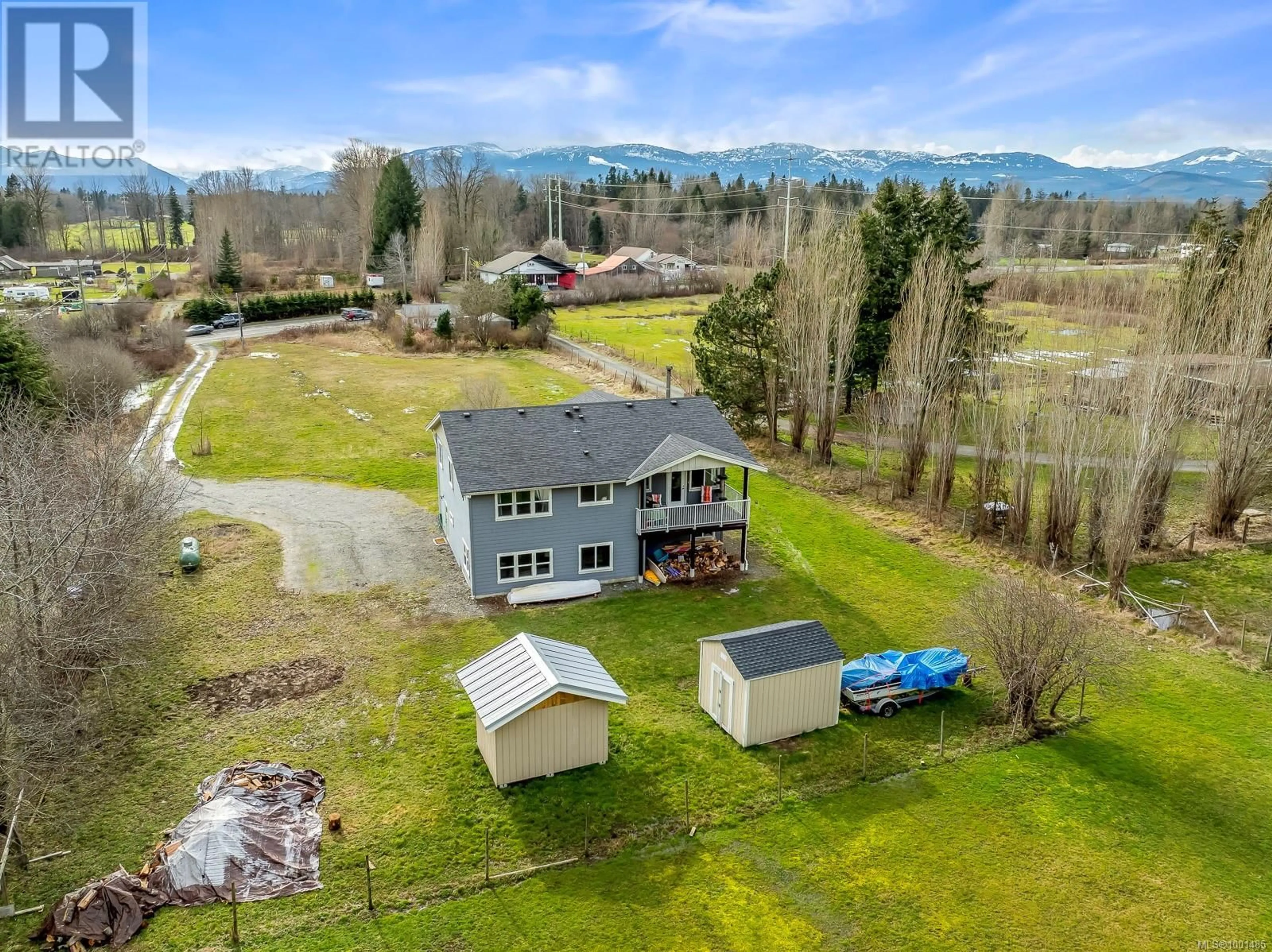 A pic from outside/outdoor area/front of a property/back of a property/a pic from drone, mountain view for 4754 HEADQUARTERS ROAD, Courtenay British Columbia V9N9H4