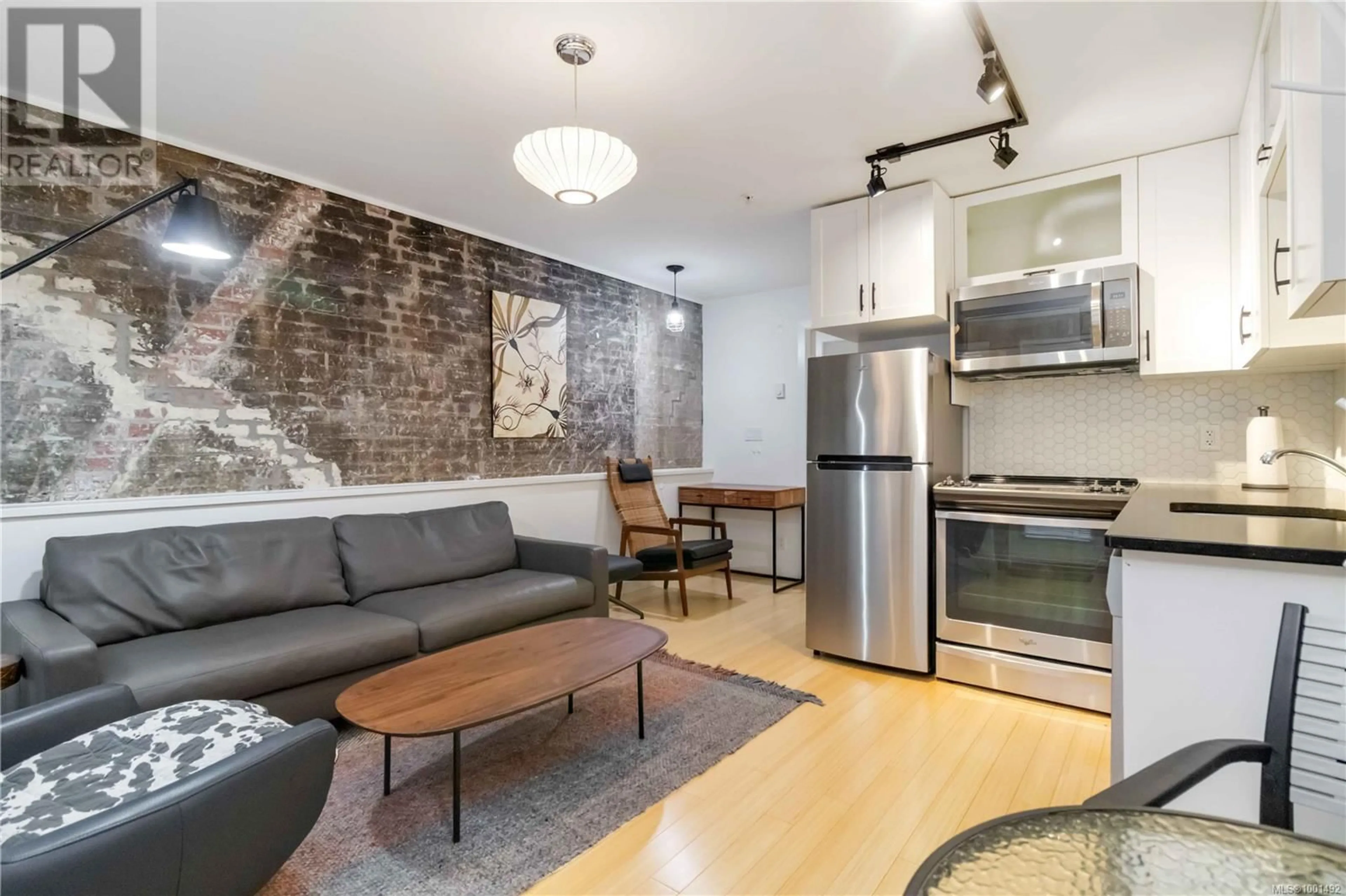 Living room with furniture, unknown for 103 - 535 FISGARD STREET, Victoria British Columbia V8W1R3