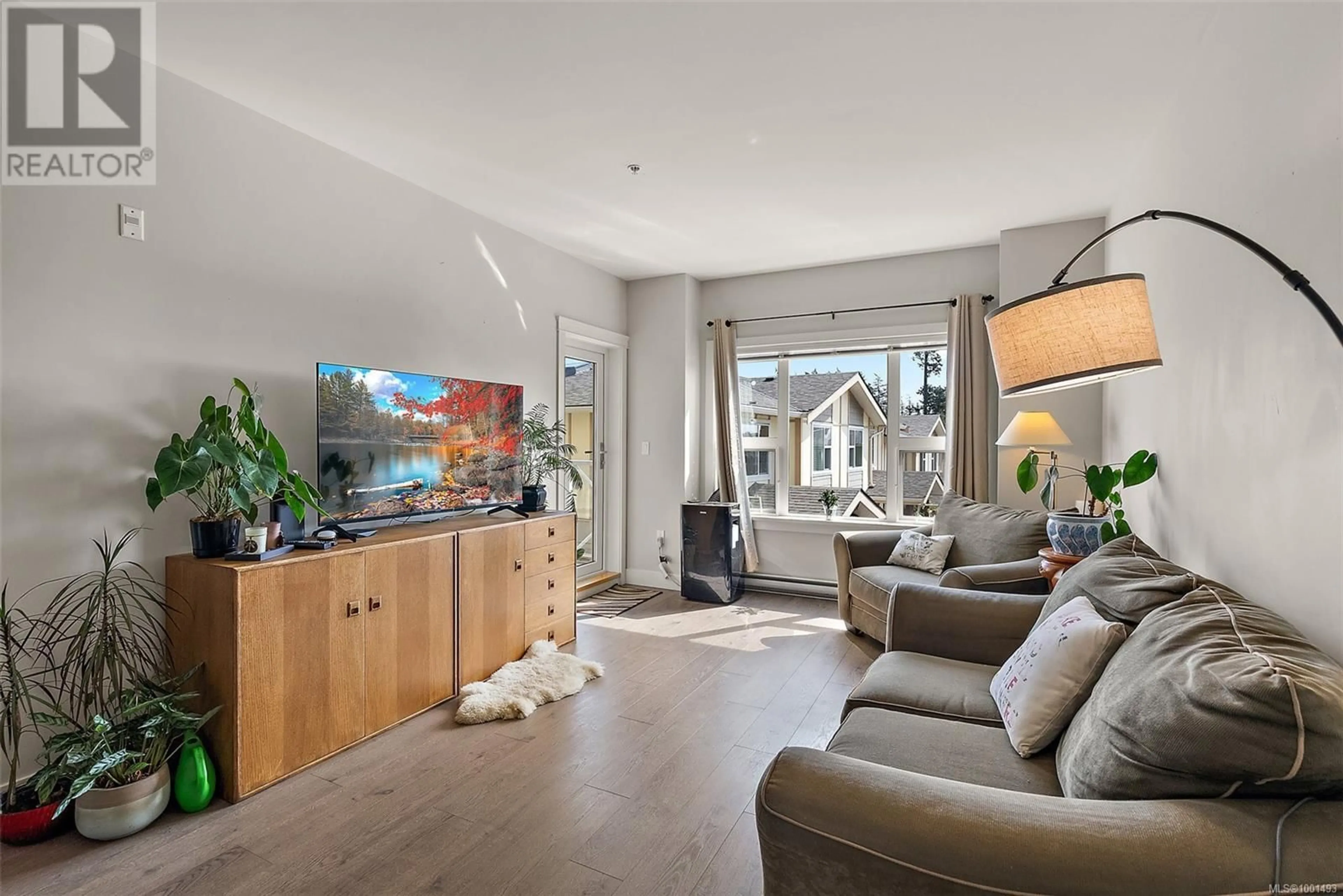 Living room with furniture, unknown for 210 - 1900 WATKISS WAY, View Royal British Columbia V9B6L9