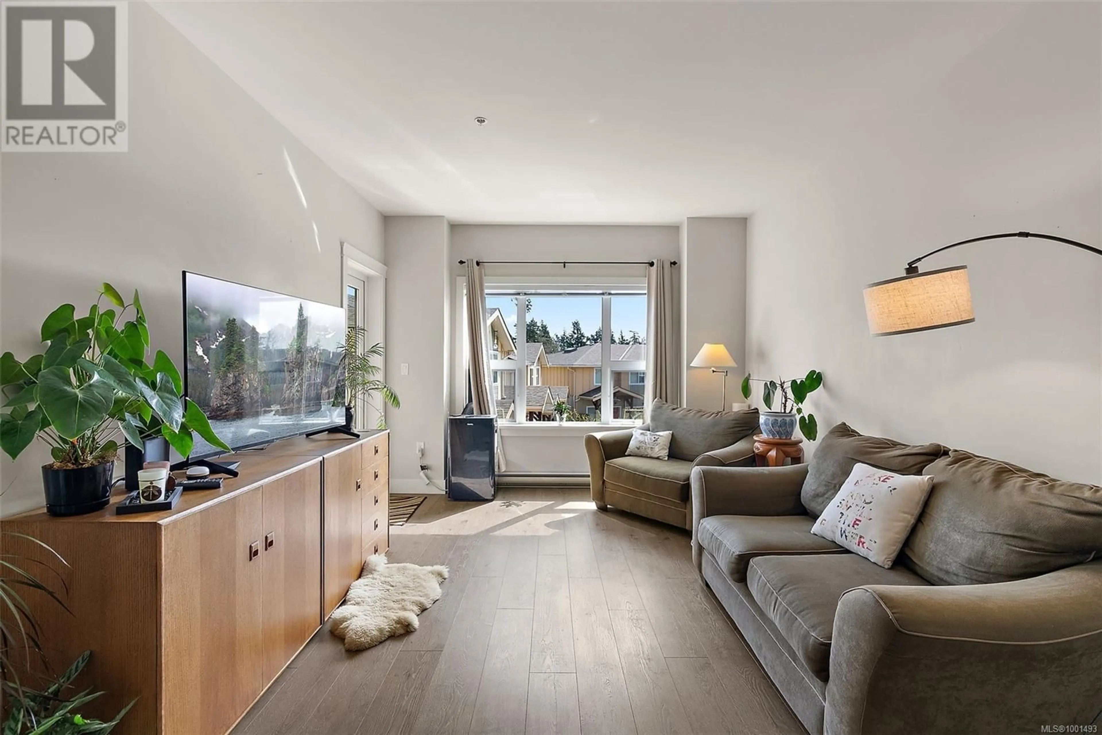 Living room with furniture, unknown for 210 - 1900 WATKISS WAY, View Royal British Columbia V9B6L9