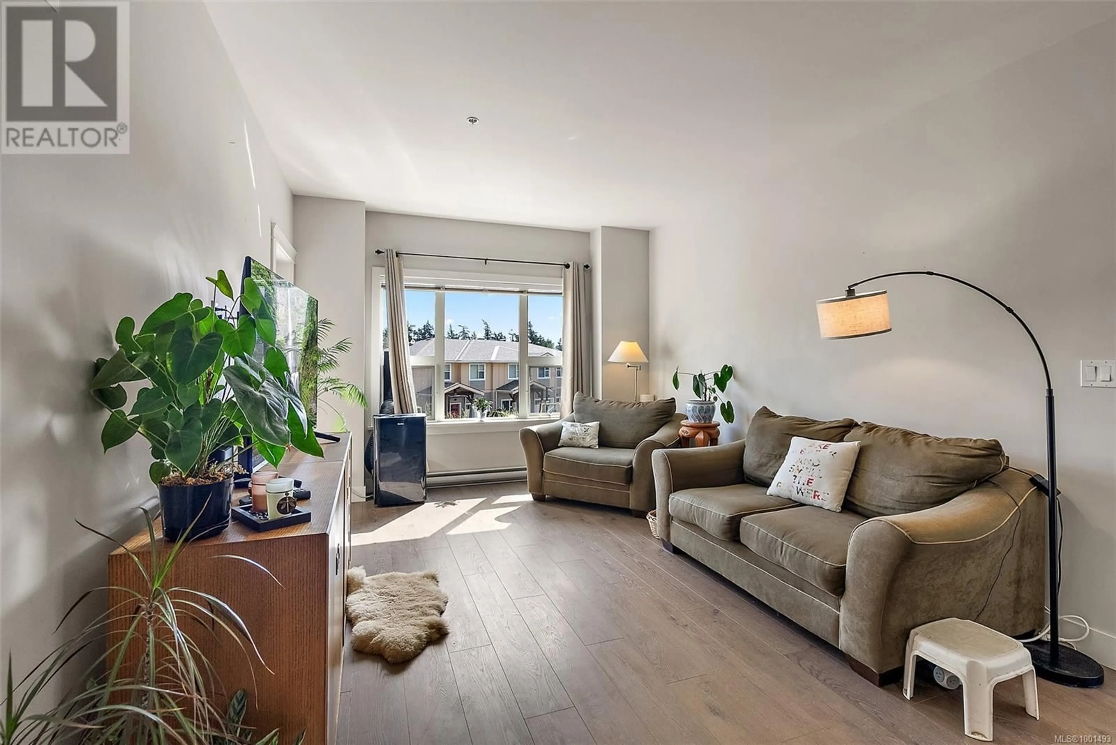 Living room with furniture, unknown for 210 - 1900 WATKISS WAY, View Royal British Columbia V9B6L9