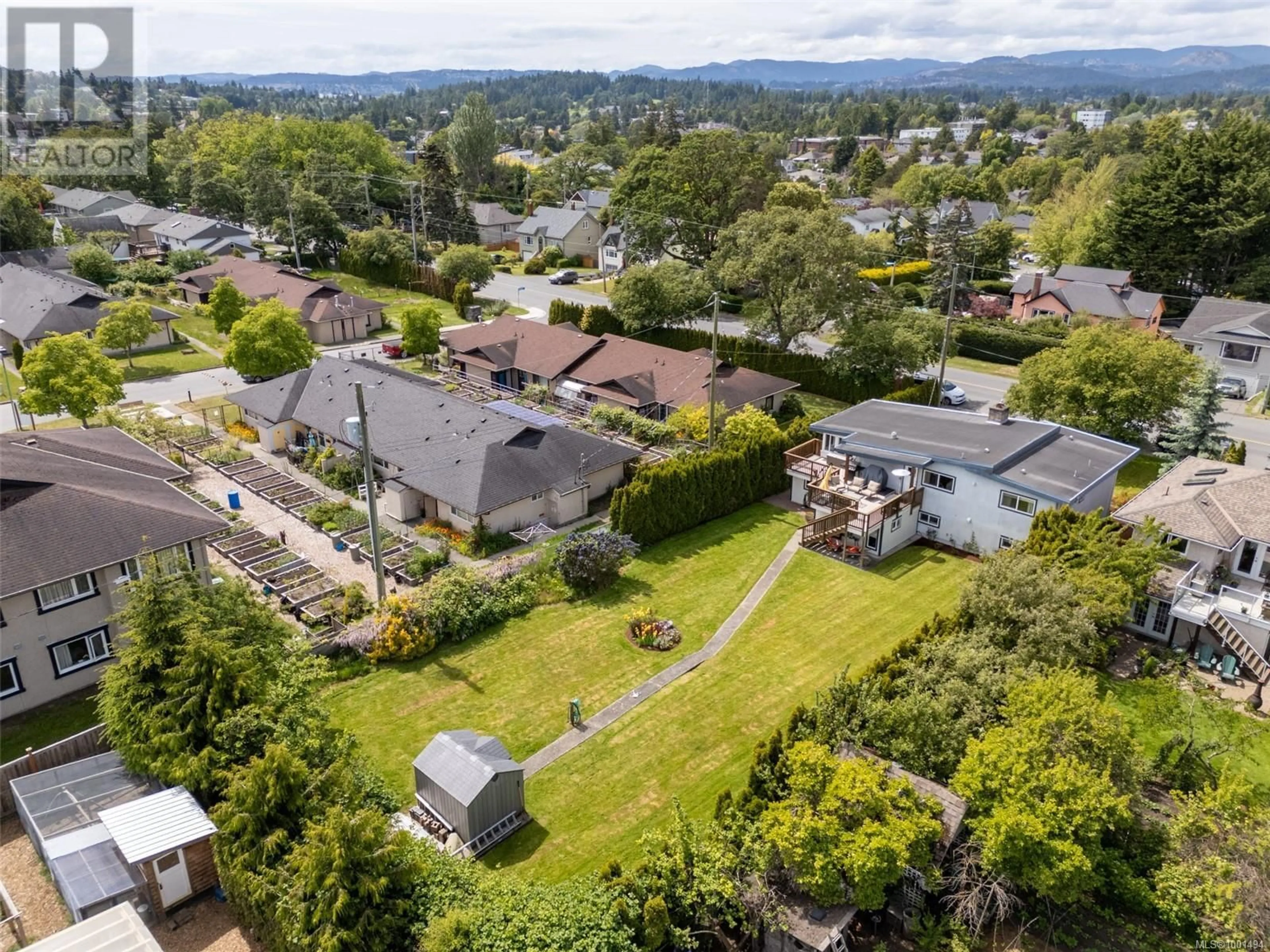 A pic from outside/outdoor area/front of a property/back of a property/a pic from drone, mountain view for 3065 HARRIET ROAD, Victoria British Columbia V9A1T6