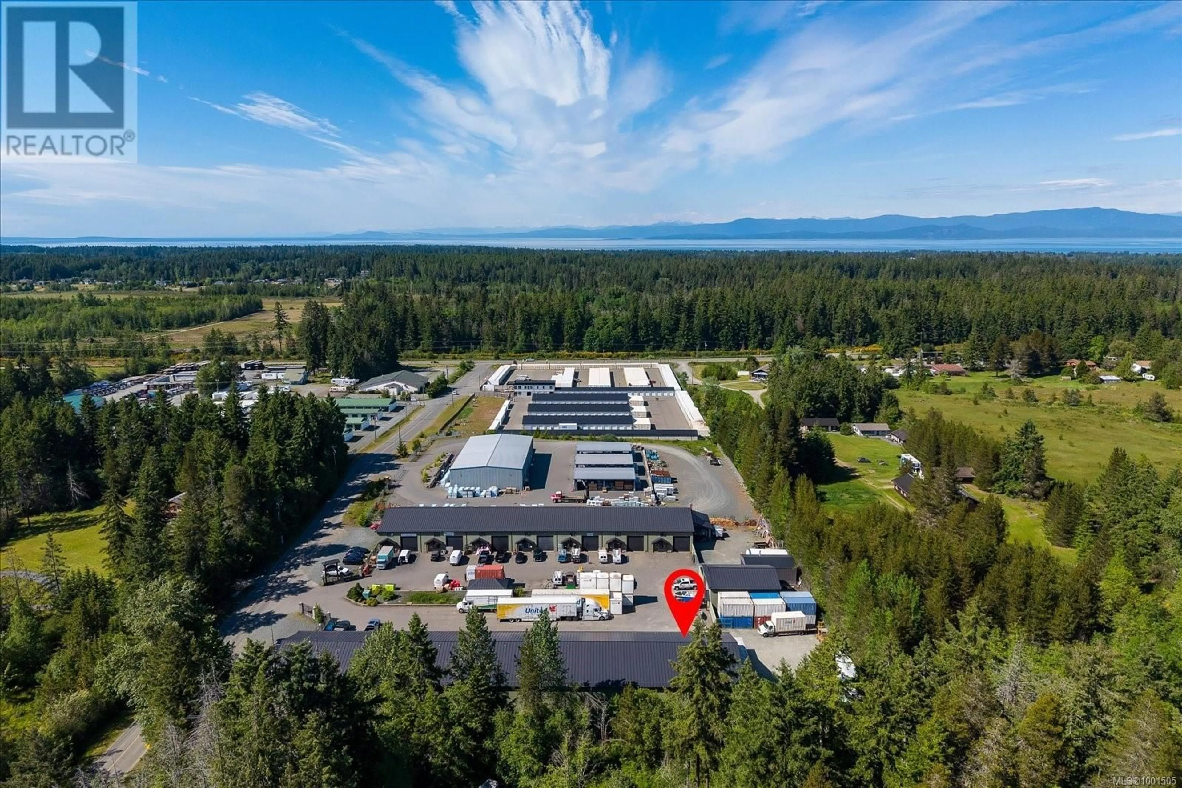 A pic from outside/outdoor area/front of a property/back of a property/a pic from drone, building for 9,10,11 - 1010 SHEARME ROAD, Coombs British Columbia V0R1M0