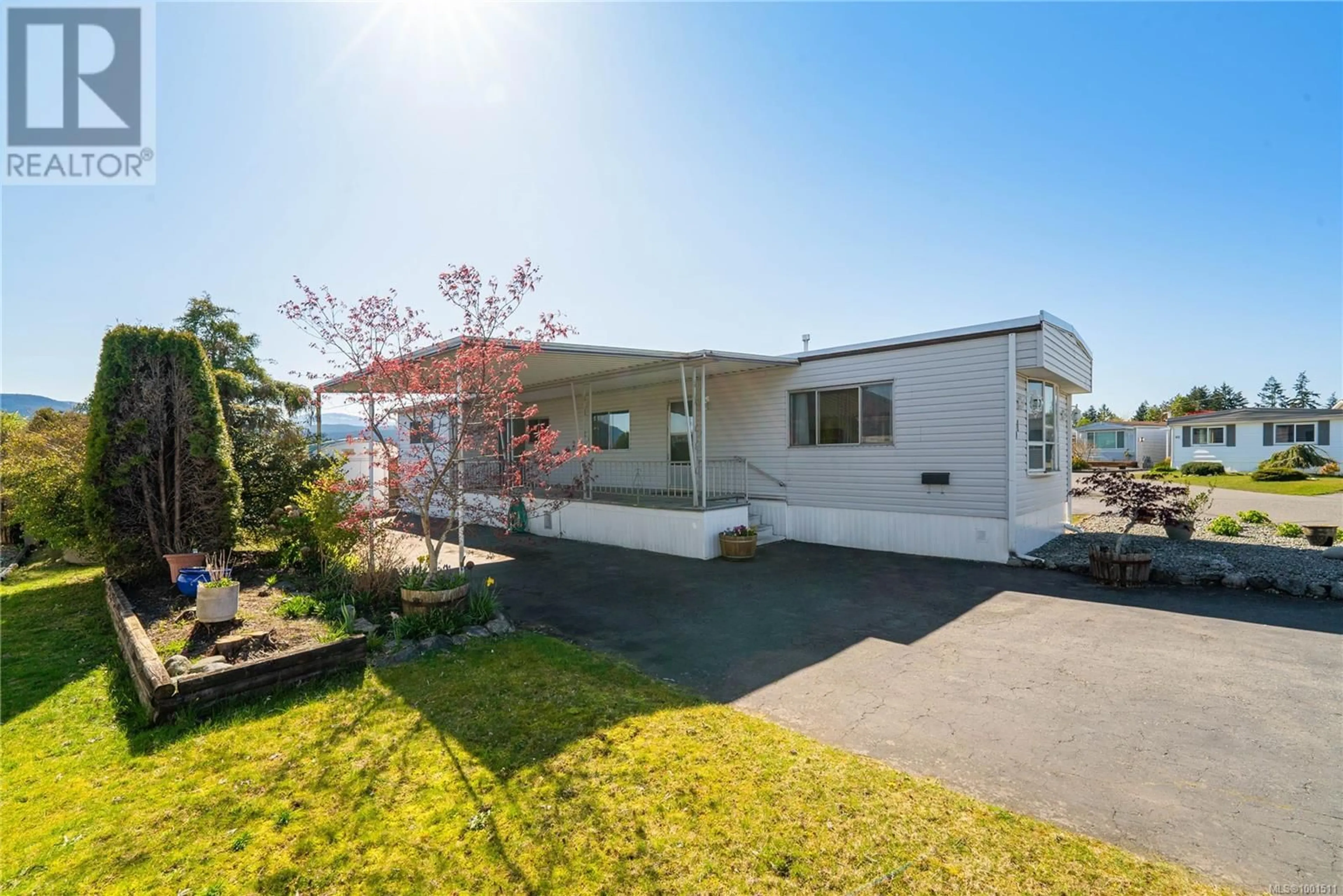 Home with vinyl exterior material, street for 51 - 6325 METRAL DRIVE, Nanaimo British Columbia V9T6P9