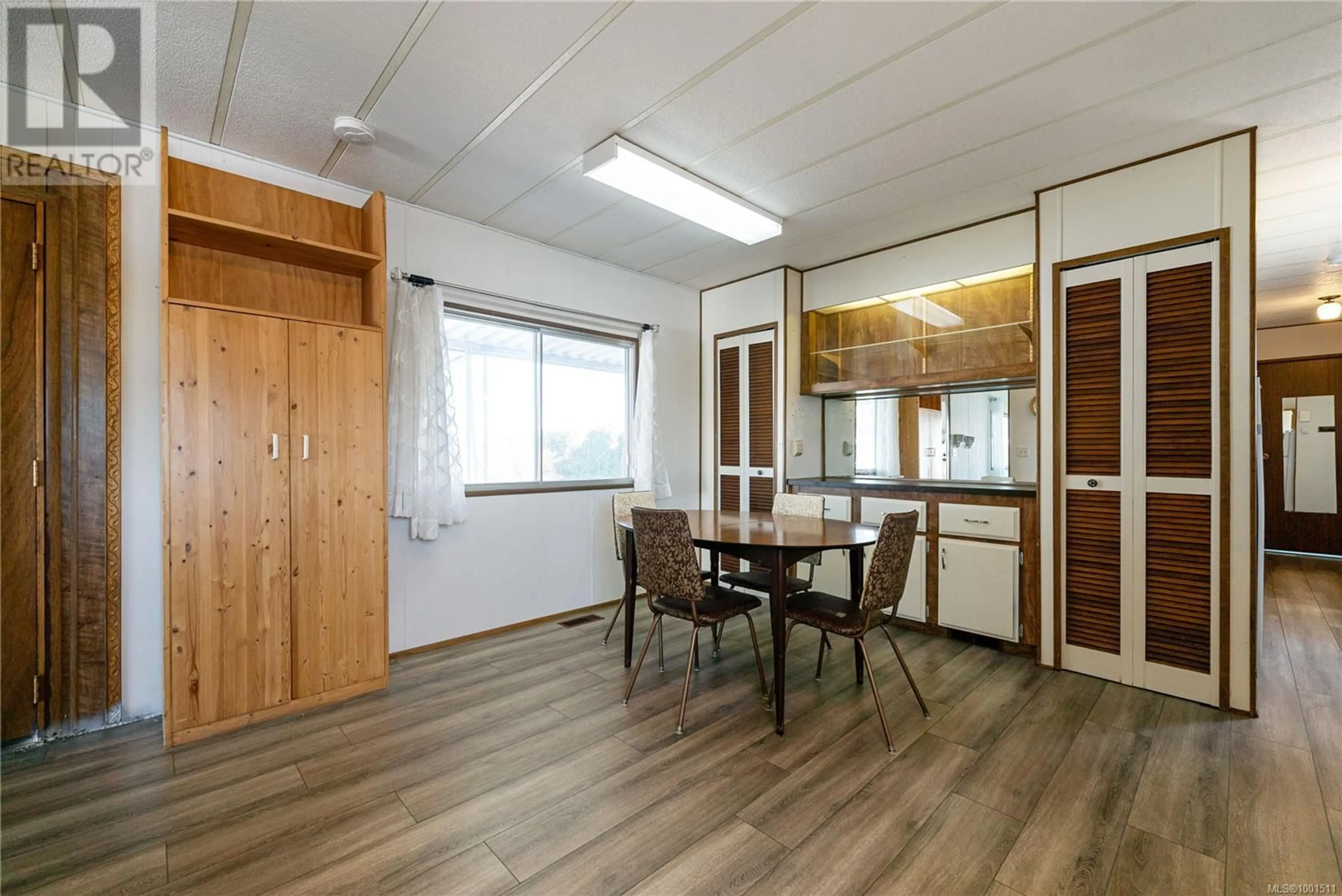 Dining room, wood/laminate floor for 51 - 6325 METRAL DRIVE, Nanaimo British Columbia V9T6P9