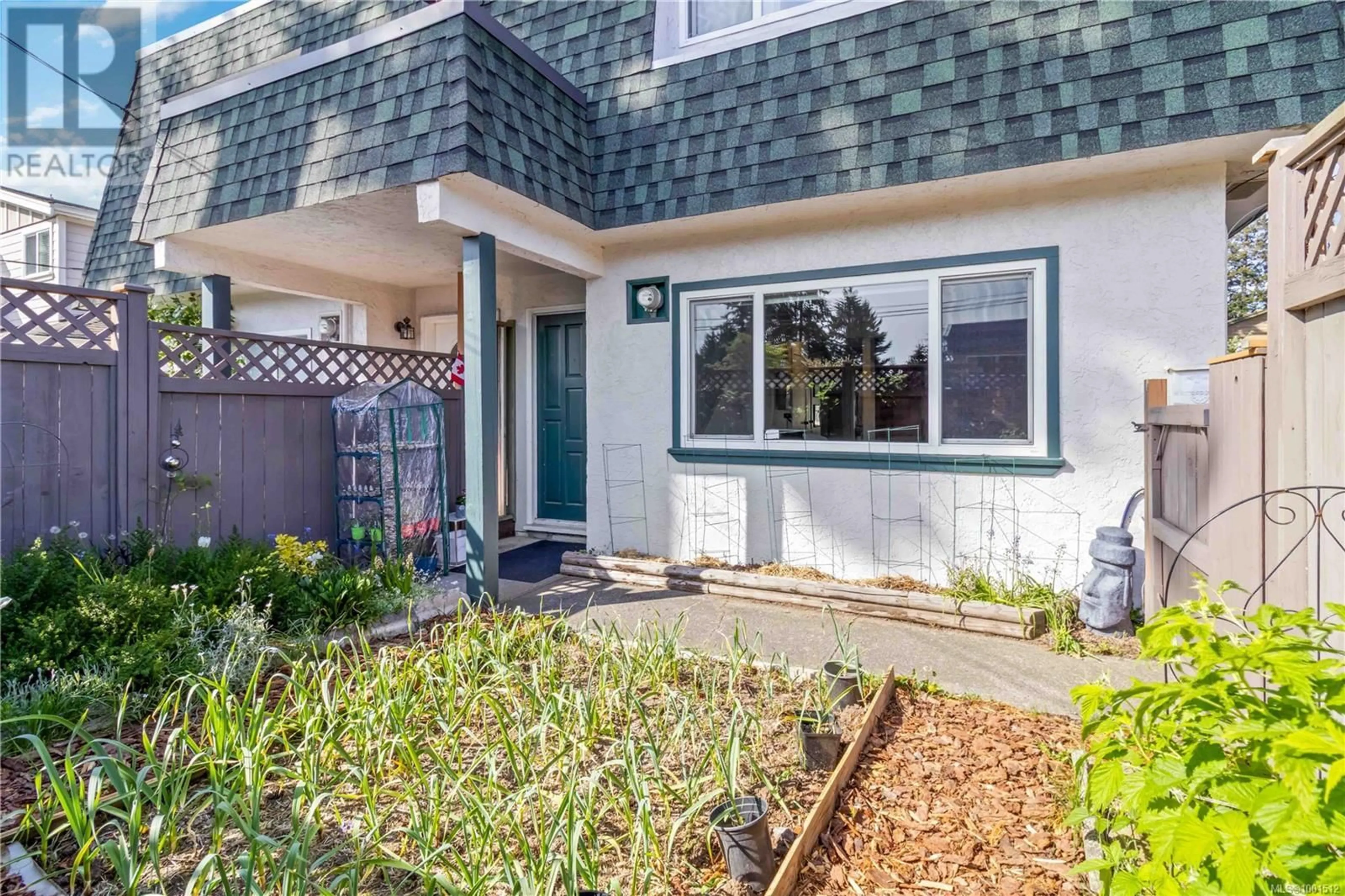 Home with vinyl exterior material, street for A - 618 KELLY ROAD, Colwood British Columbia V9B2A5