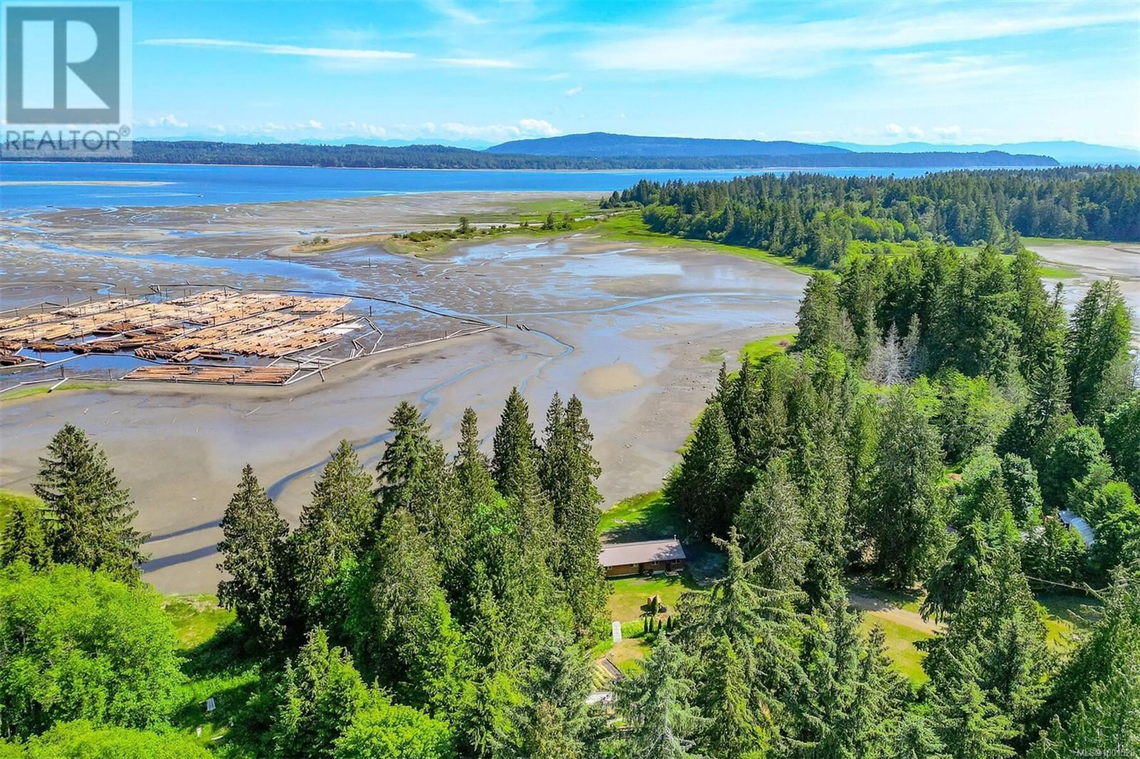A pic from outside/outdoor area/front of a property/back of a property/a pic from drone, water/lake/river/ocean view for 634 CURRAN ROAD, Fanny Bay British Columbia V0R1W0