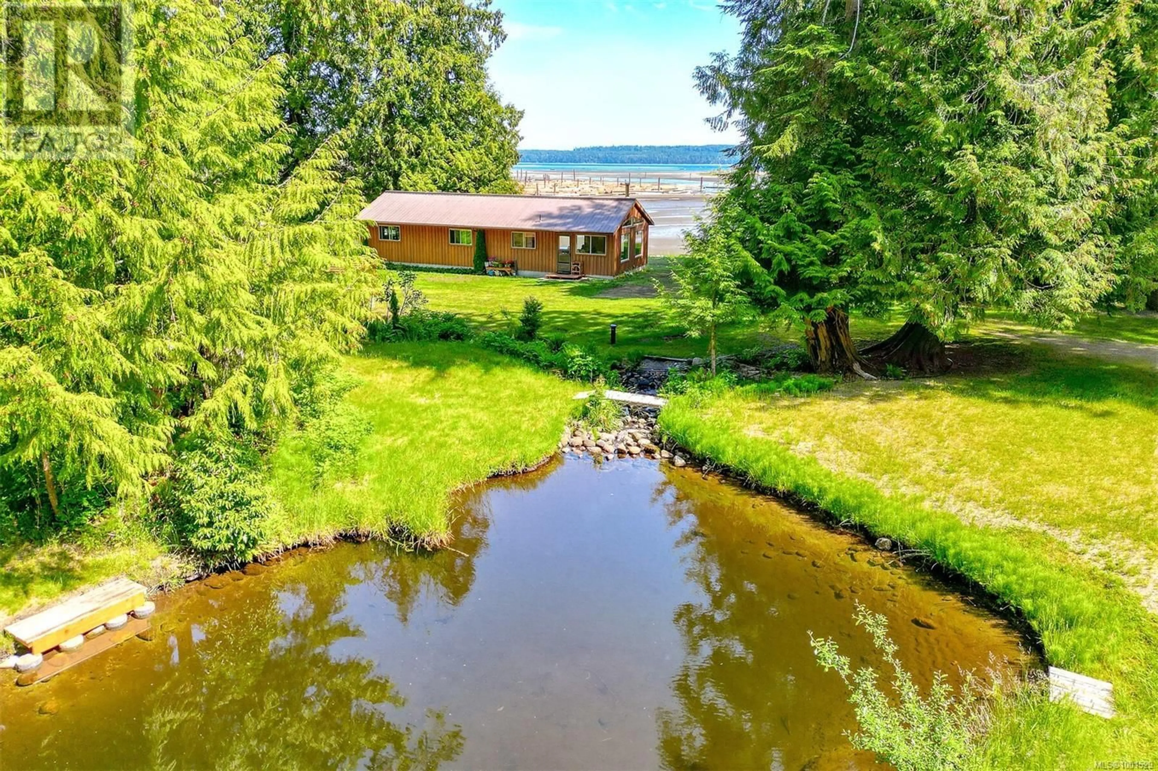 A pic from outside/outdoor area/front of a property/back of a property/a pic from drone, water/lake/river/ocean view for 634 CURRAN ROAD, Fanny Bay British Columbia V0R1W0