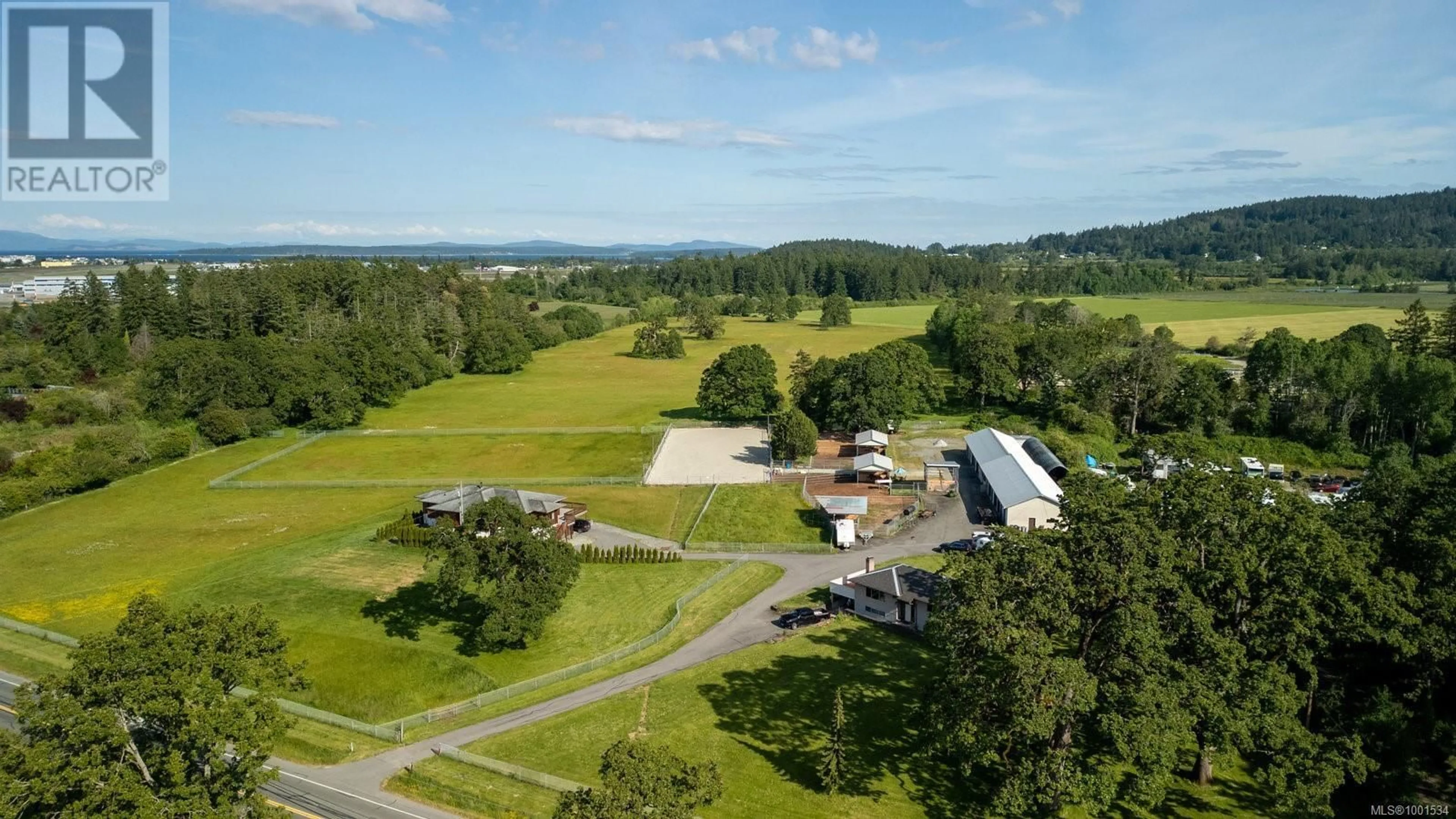 A pic from outside/outdoor area/front of a property/back of a property/a pic from drone, mountain view for 9775 WEST SAANICH ROAD, North Saanich British Columbia V8L5T5