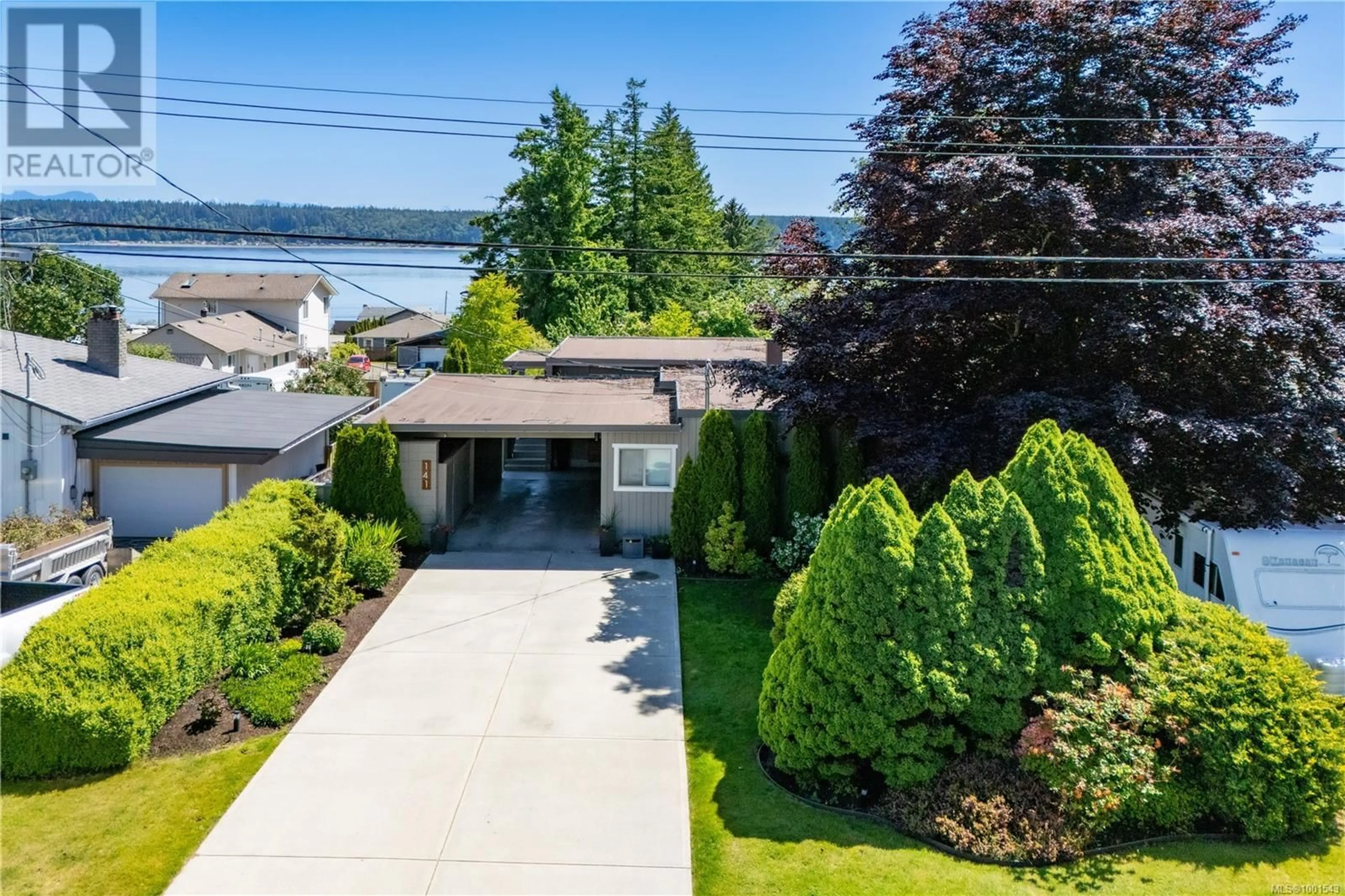 A pic from outside/outdoor area/front of a property/back of a property/a pic from drone, water/lake/river/ocean view for 141 THULIN STREET, Campbell River British Columbia V9W2K4