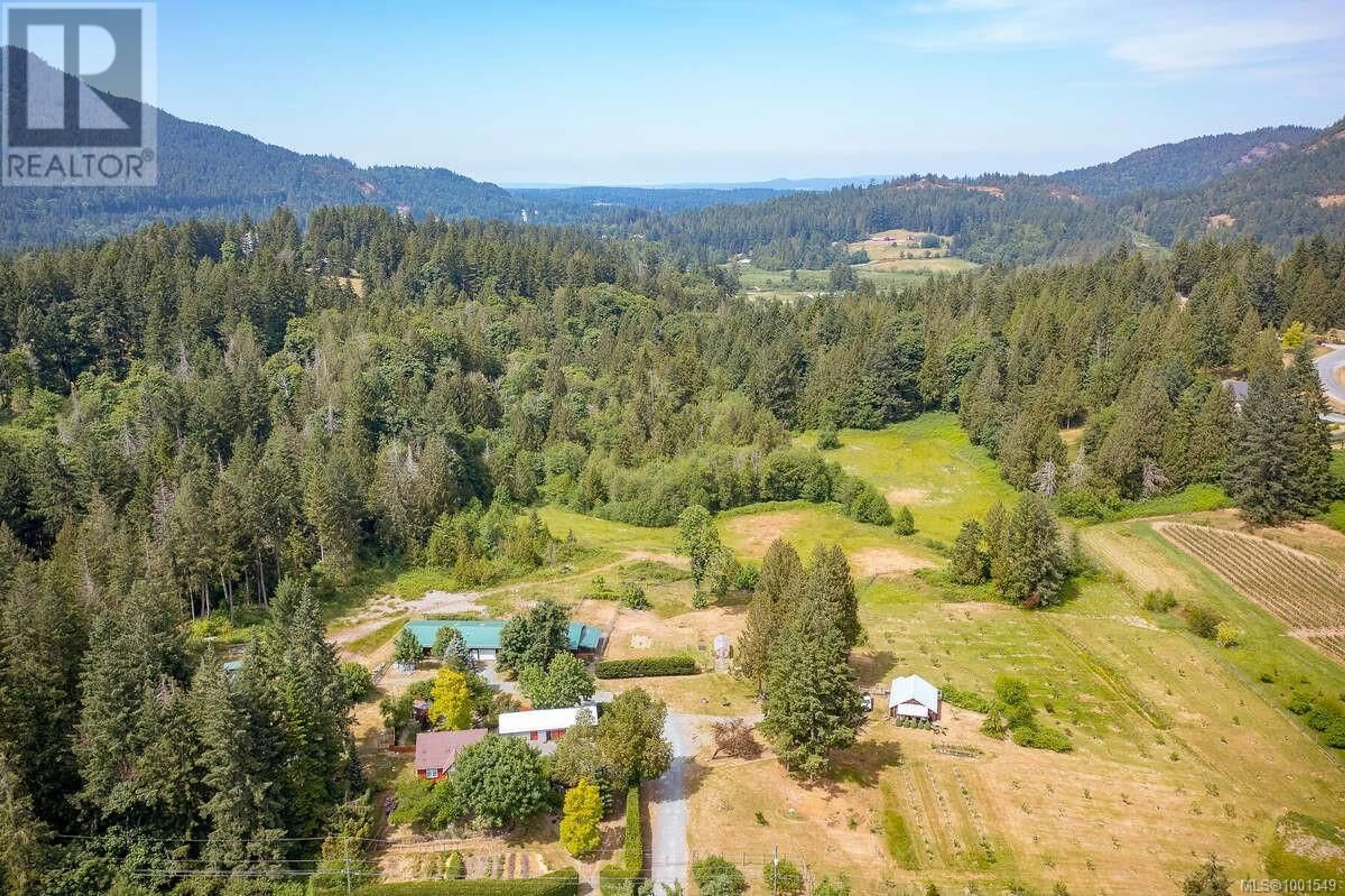 A pic from outside/outdoor area/front of a property/back of a property/a pic from drone, mountain view for 7661 MAYS ROAD, Duncan British Columbia V9L6A8