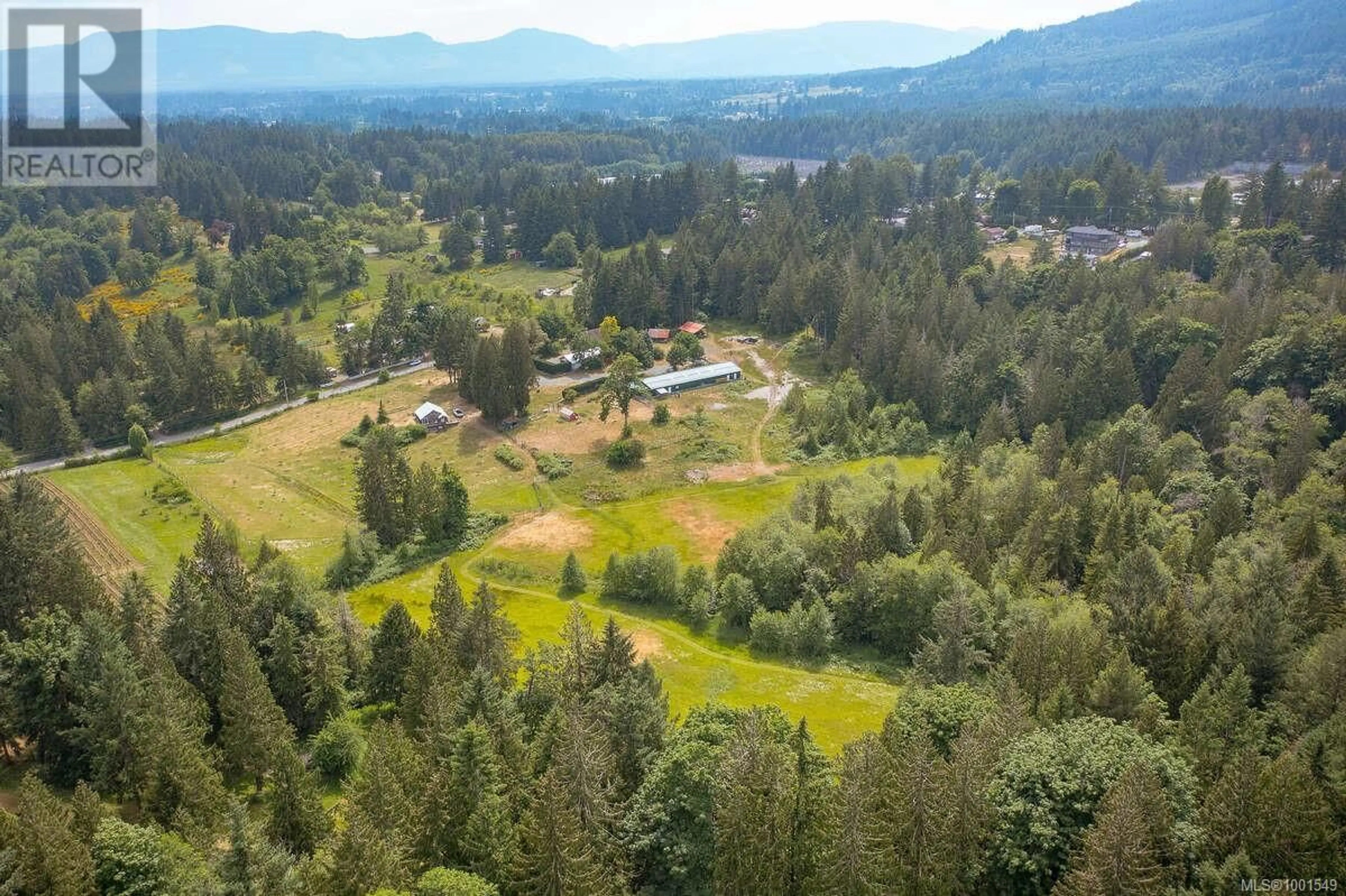 A pic from outside/outdoor area/front of a property/back of a property/a pic from drone, forest/trees view for 7661 MAYS ROAD, Duncan British Columbia V9L6A8