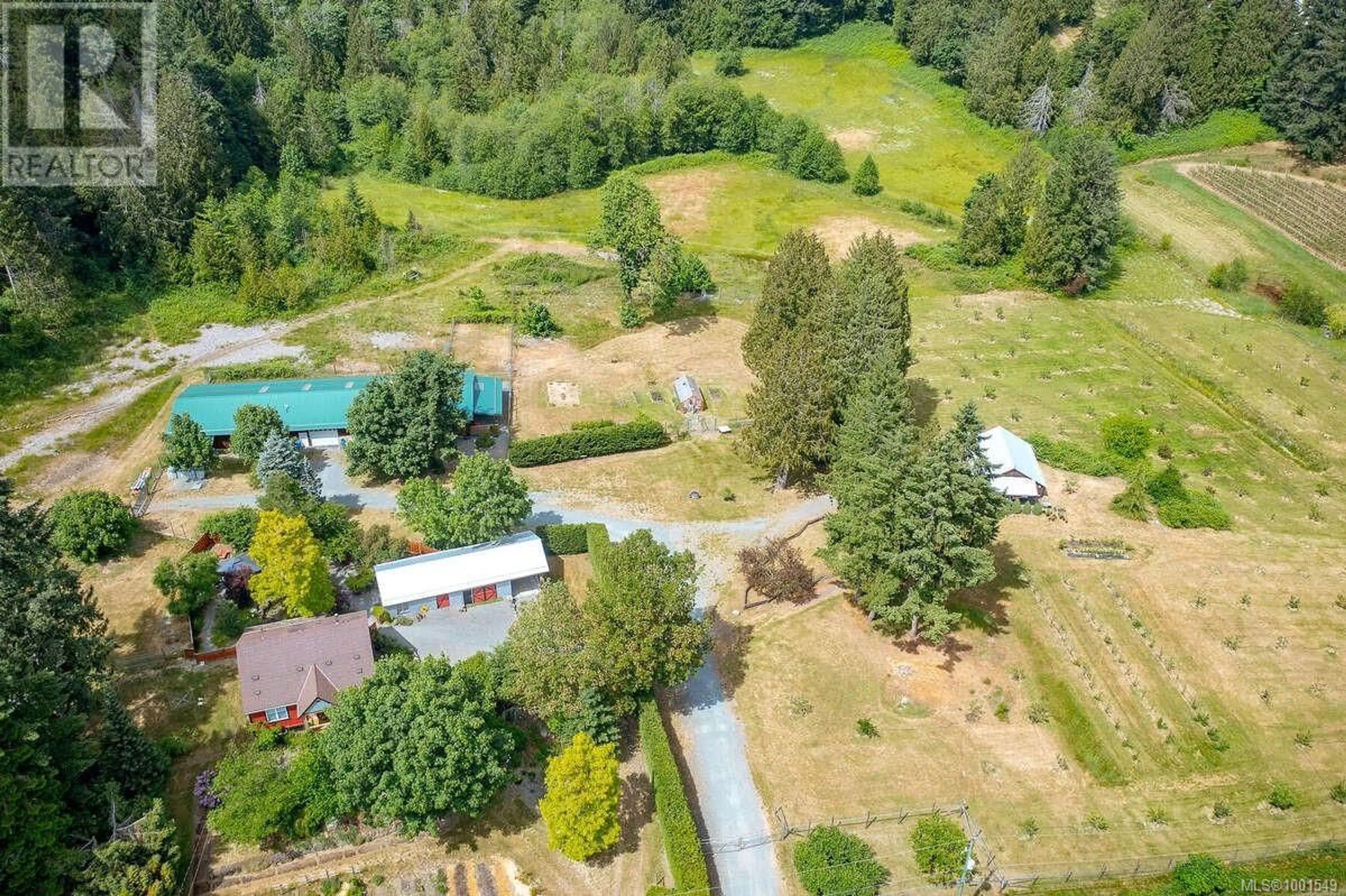 A pic from outside/outdoor area/front of a property/back of a property/a pic from drone, forest/trees view for 7661 MAYS ROAD, Duncan British Columbia V9L6A8
